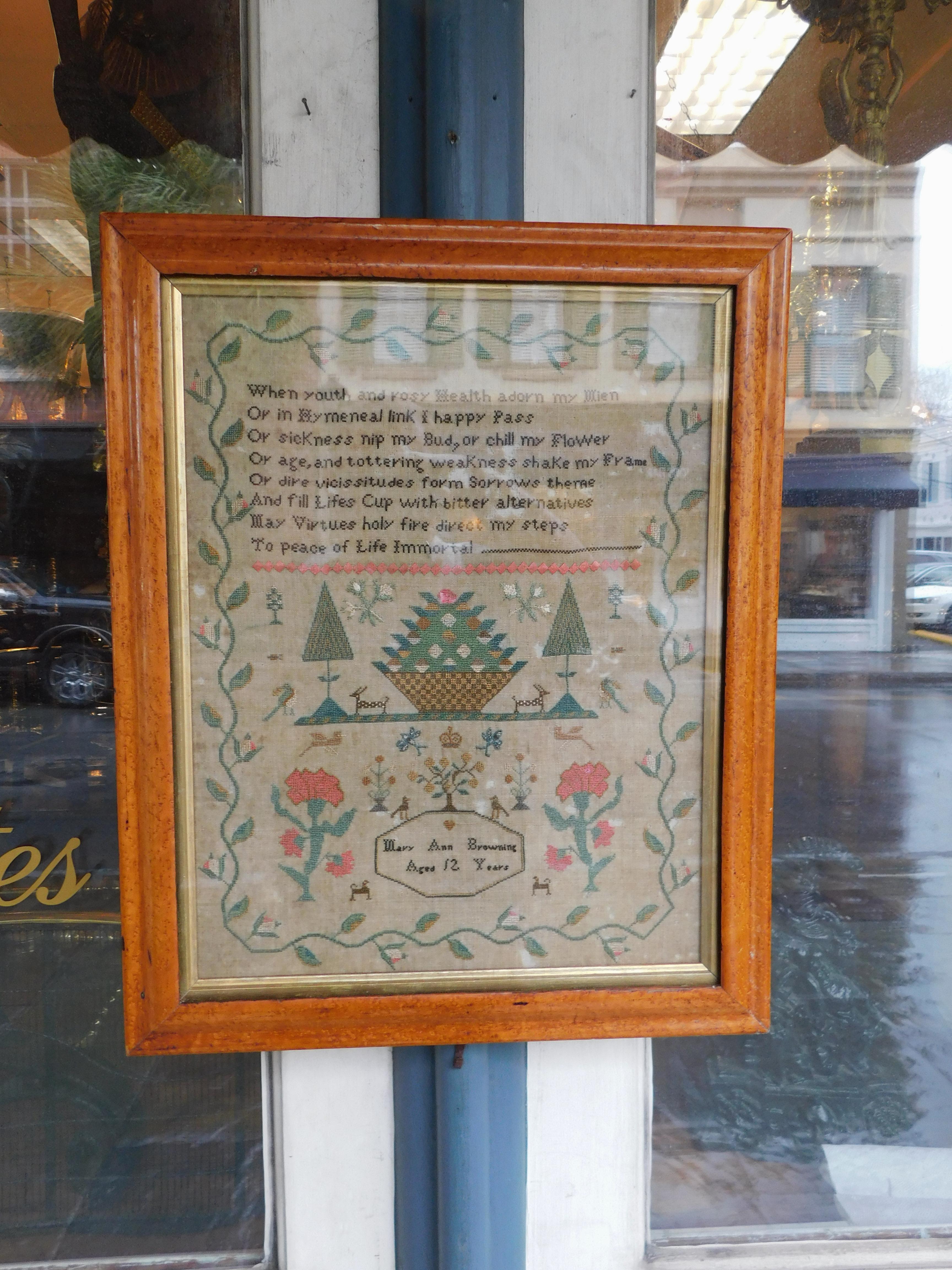 American sampler under glass with the original gilt Birdseye maple molded edge frame, Early 19th Century. Signed by maker Mary Ann Browning, Age 12.