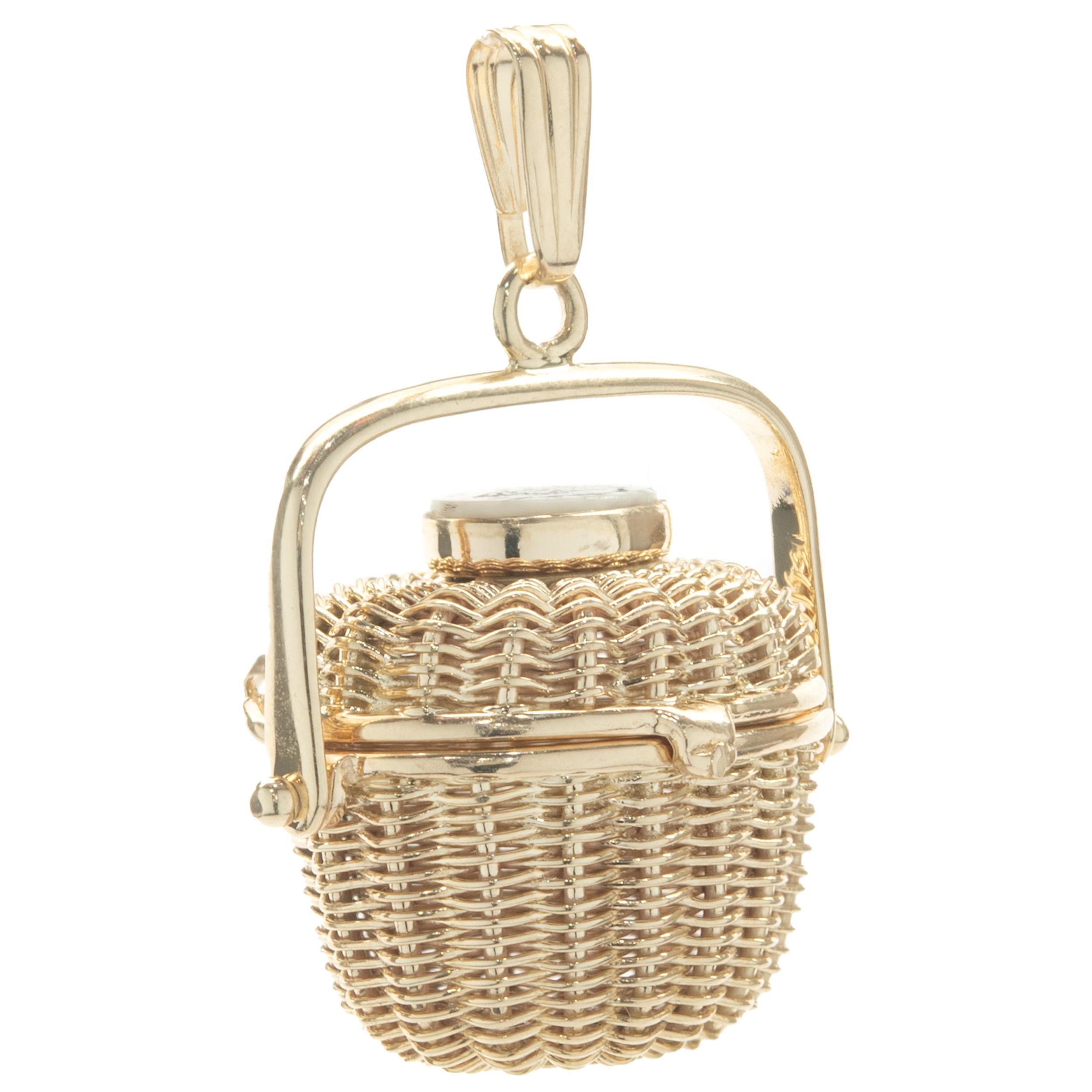 Designer: American Scrimshow
Material: 14K yellow gold
Dimensions: pendant measures 29mm long
Weight: 6.4 grams