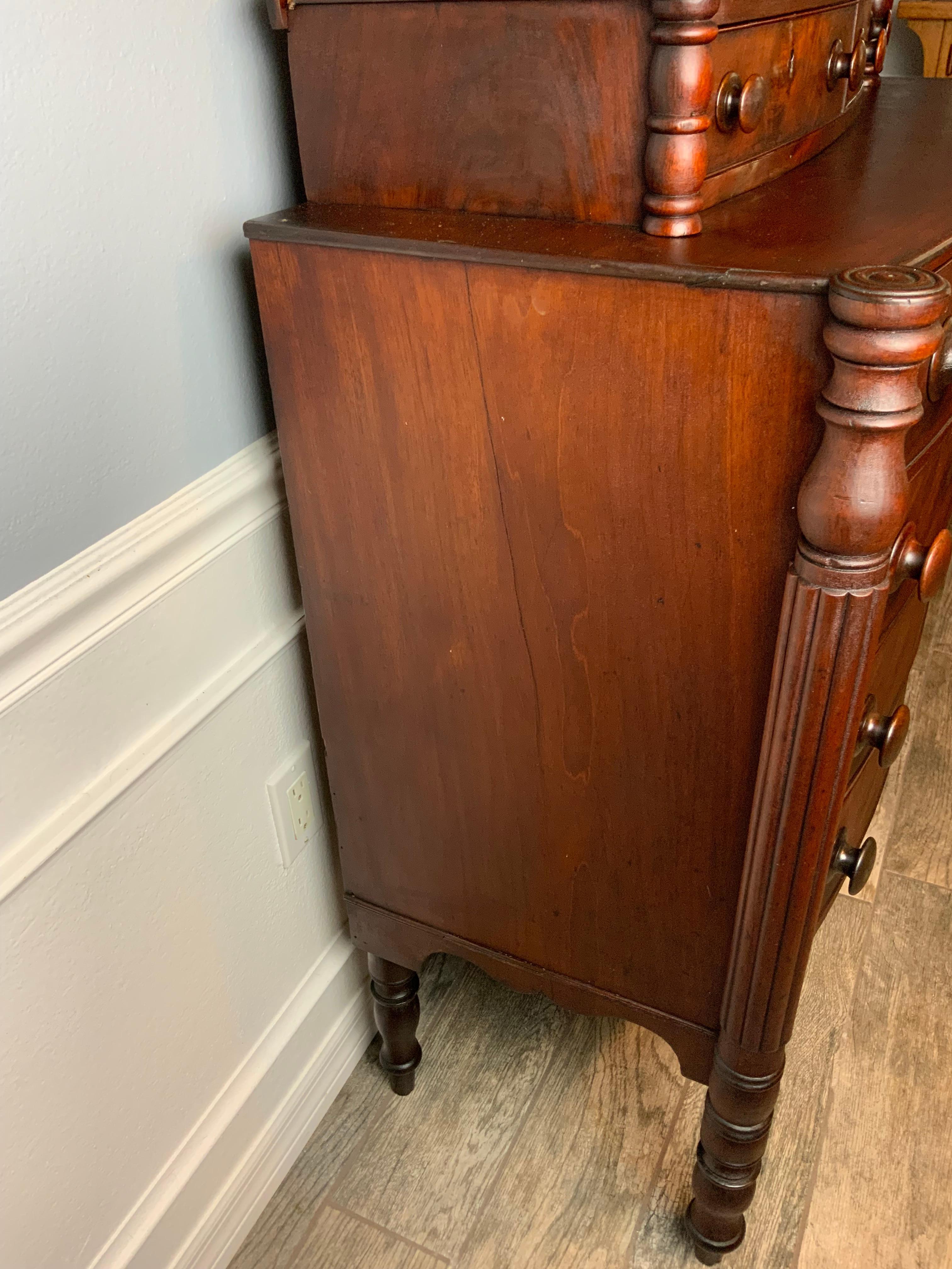 One of the cleanest and most original American Sheraton chests we’ve had.   This piece is in its original finish and retains all the original working locks and drawer pulls.  Excellent color and aged patina to the lightly crazed varnish surface.