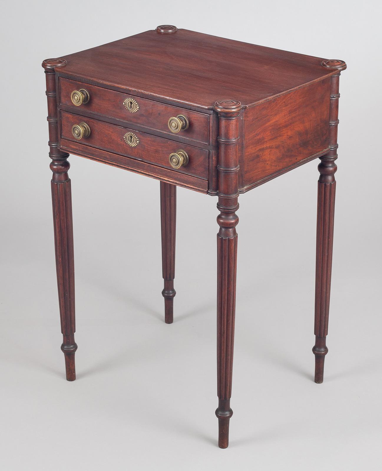 American, Federal, Sheraton mahogany work table, Salem, Massachusetts, with two cock-beaded drawers, the top drawer with compartments, ring turned turret corners, ending in finely reeded tapered legs. Paper label on the back reads: T.G.Buckley, 690