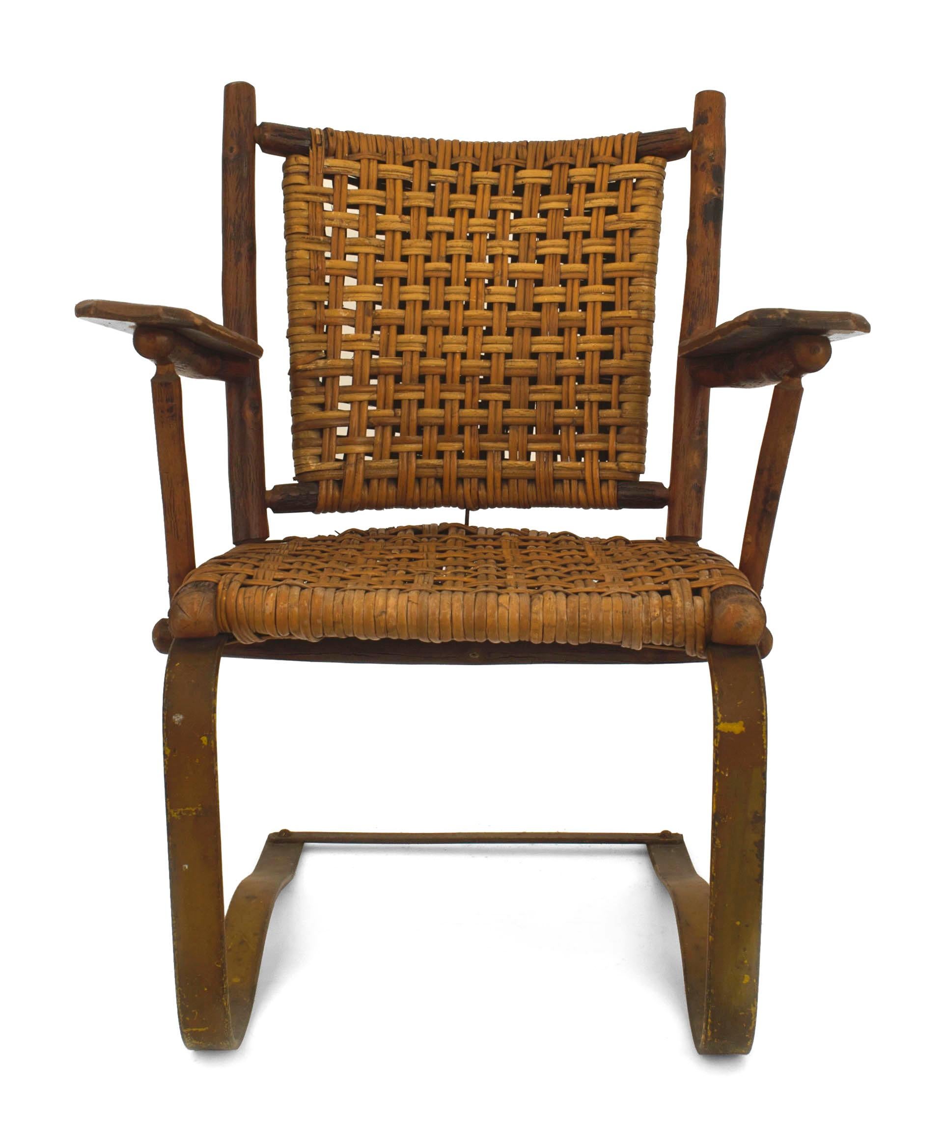 American rustic Old Hickory bounce armchairs with an iron base and woven seat and back (signed) (2 - Priced Each).


Since 1899 Old Hickory Furniture has been handcrafted in Central Indiana using the remarkable hickory sapling and other natural and