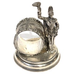 Antique American Silverplated Figural Napkin Ring of a Knight with Sword and Torch 