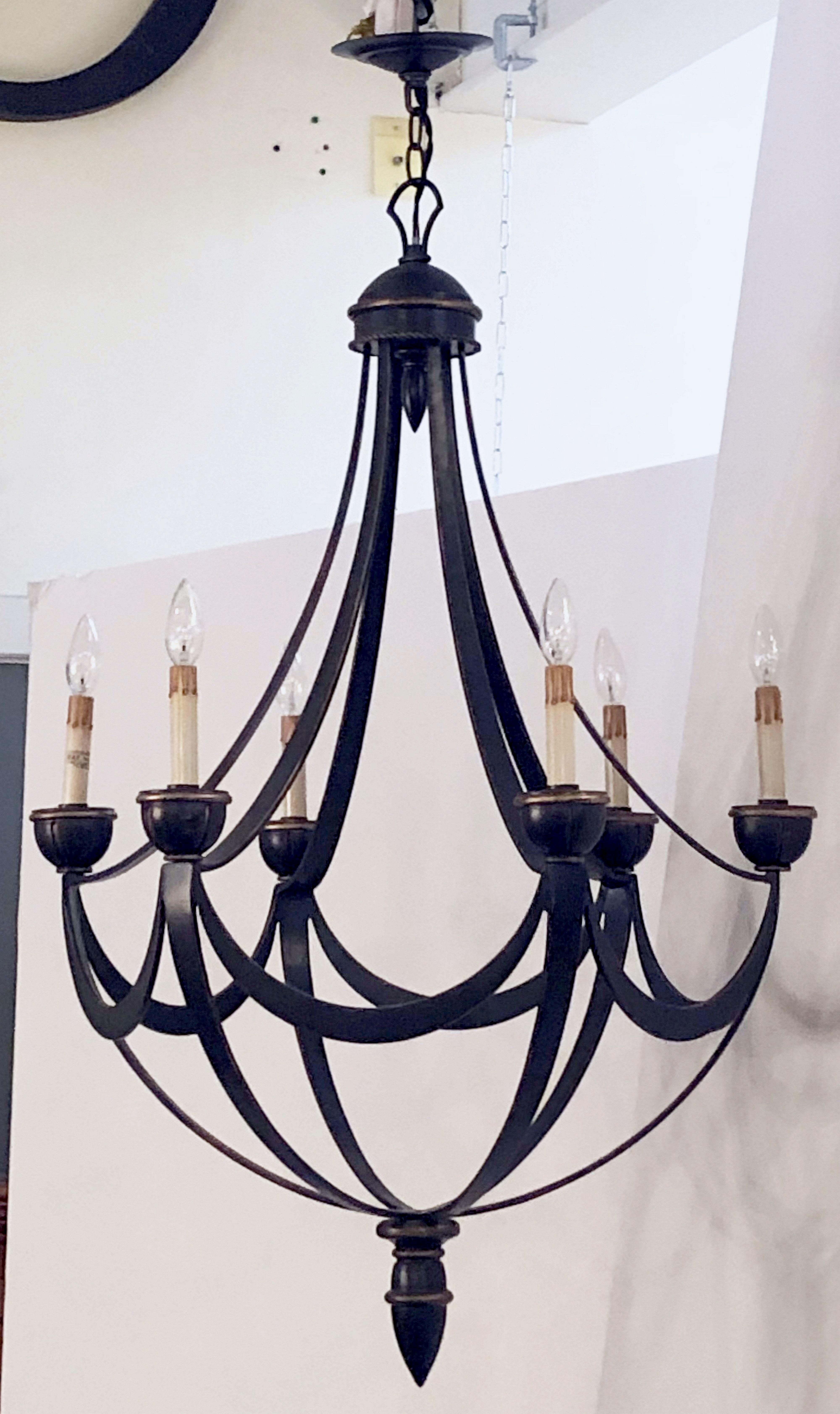A handsome American six-light hanging light fixture or chandelier (29 inches diameter) of metal and resin, featuring a modern Empire-style design, with elegant gilt accents.

U.S. wired, ready for display.