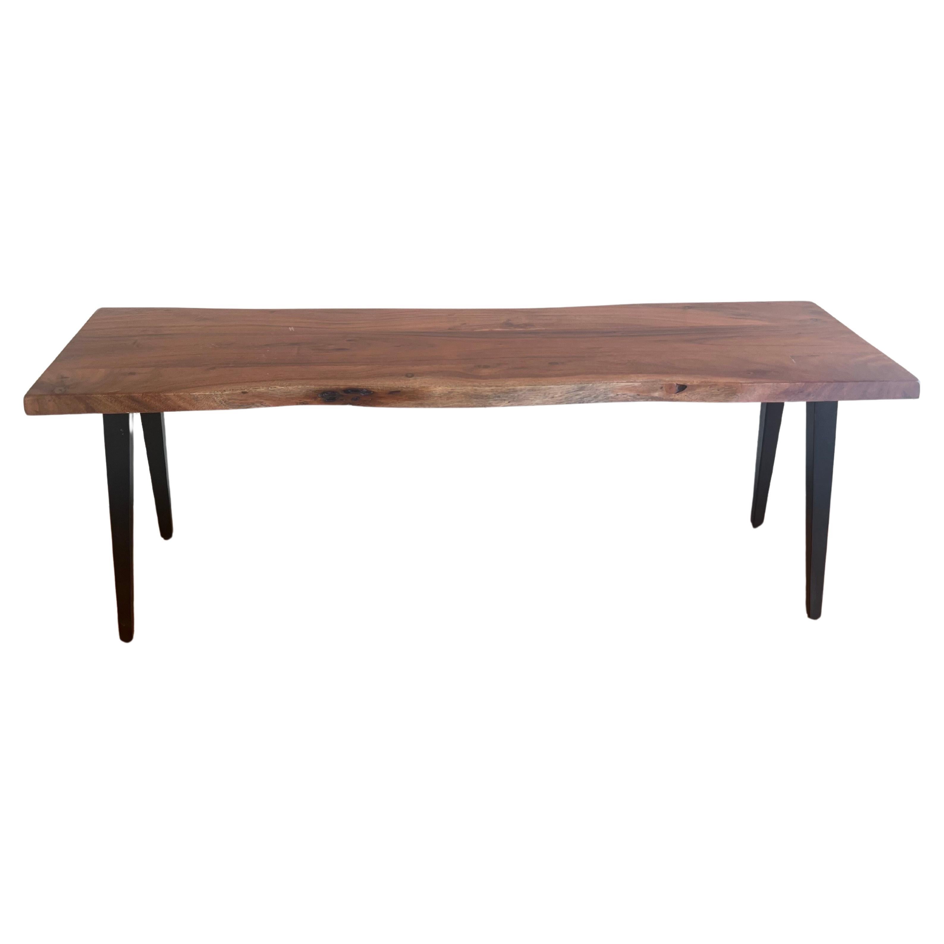 Beautiful Solid Mahogany live edge coffee table/bench with nice black enameled solid metal tapered legs, custom made in 2012 can be used as a coffee table or a bench solid and sturdy, great quality, and in nice condition.