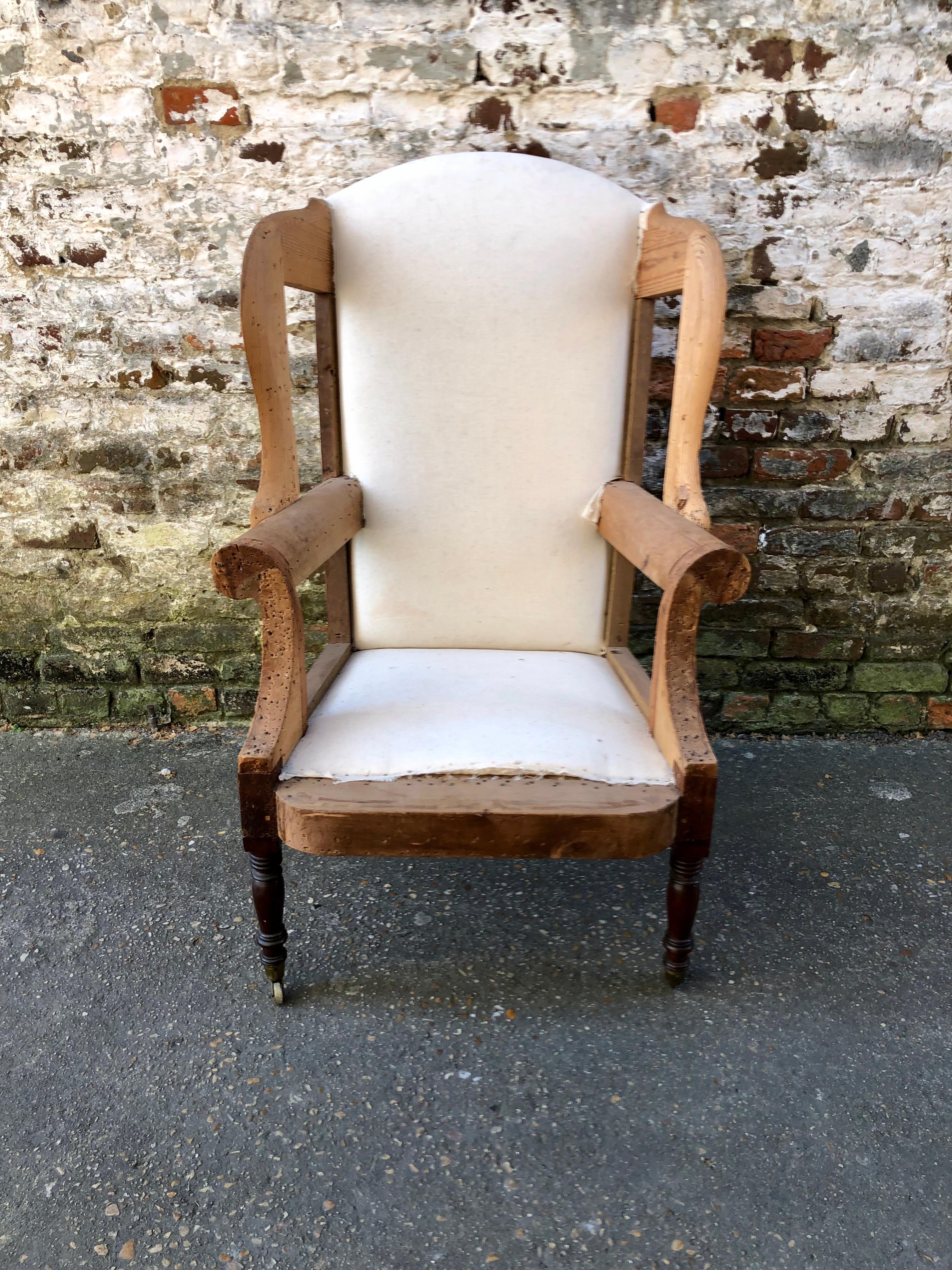 American wingback chair. Front turned legs are mahogany with back legs of cherry. Yellow pine and polar secondary woods. Chair Is attributed Richmond, VA.