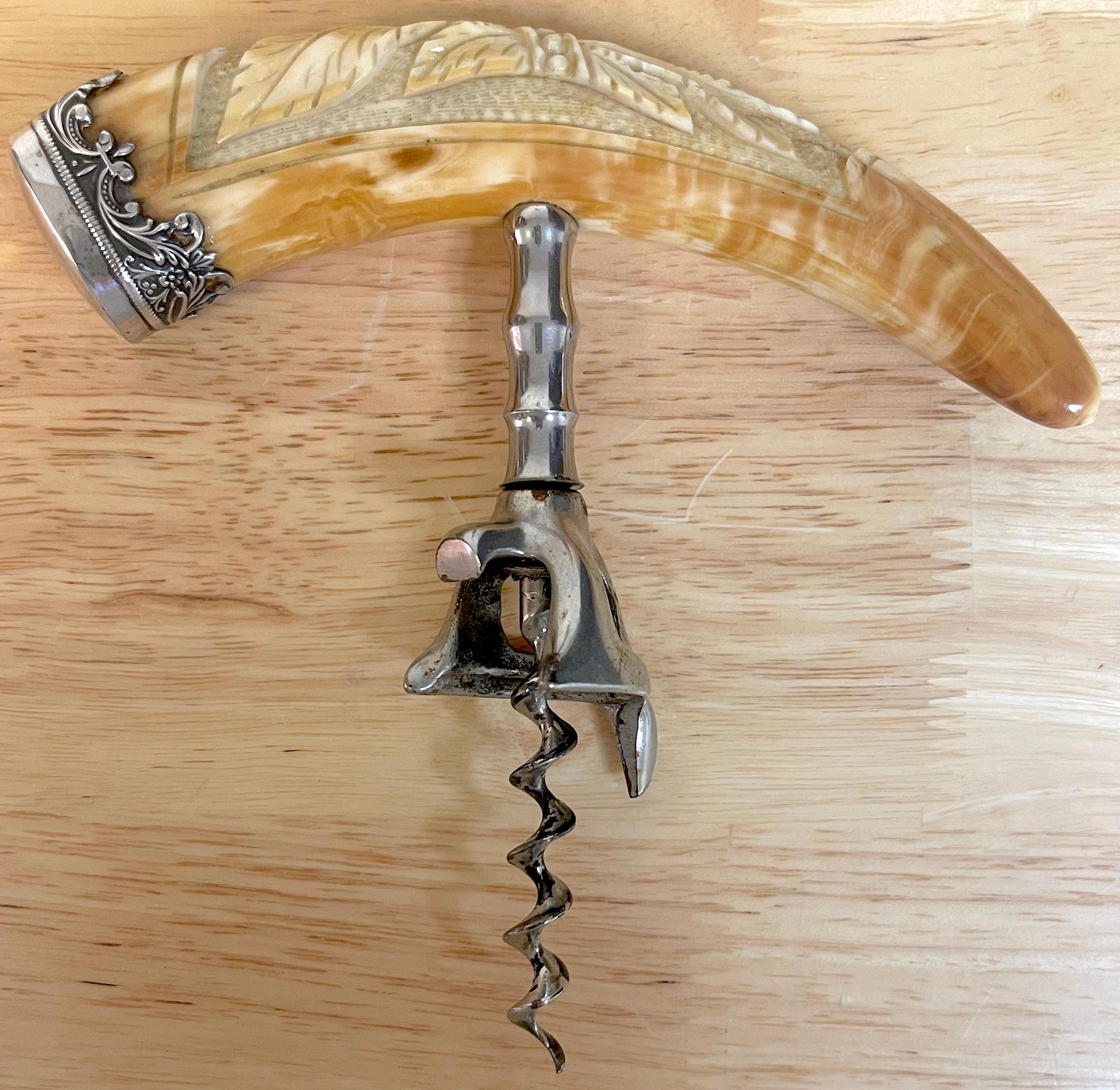 American sterling & carved horn laurel motif corkscrew, Beautiful natural horn carved with a bound laurel motif, with sterling scrolled end cap, with silvered metal corkscrew. Stamped 'sterling'.