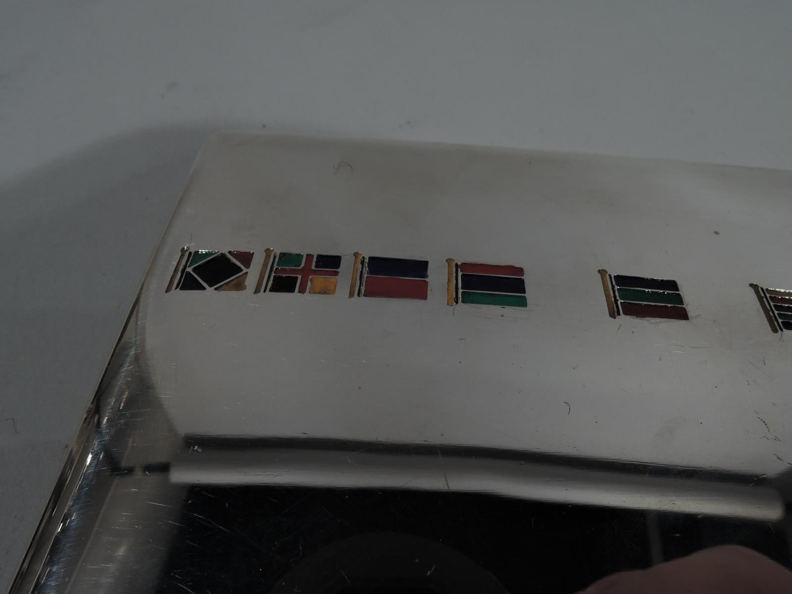 Nautical sterling silver and enamel cigarette case. Made by Thomae in Attleboro, Mass., ca 1960. Rectangular and hinged. Signal flags enameled on front. Gilt interior. Hallmarked. Weight: 4.8 troy ounces.