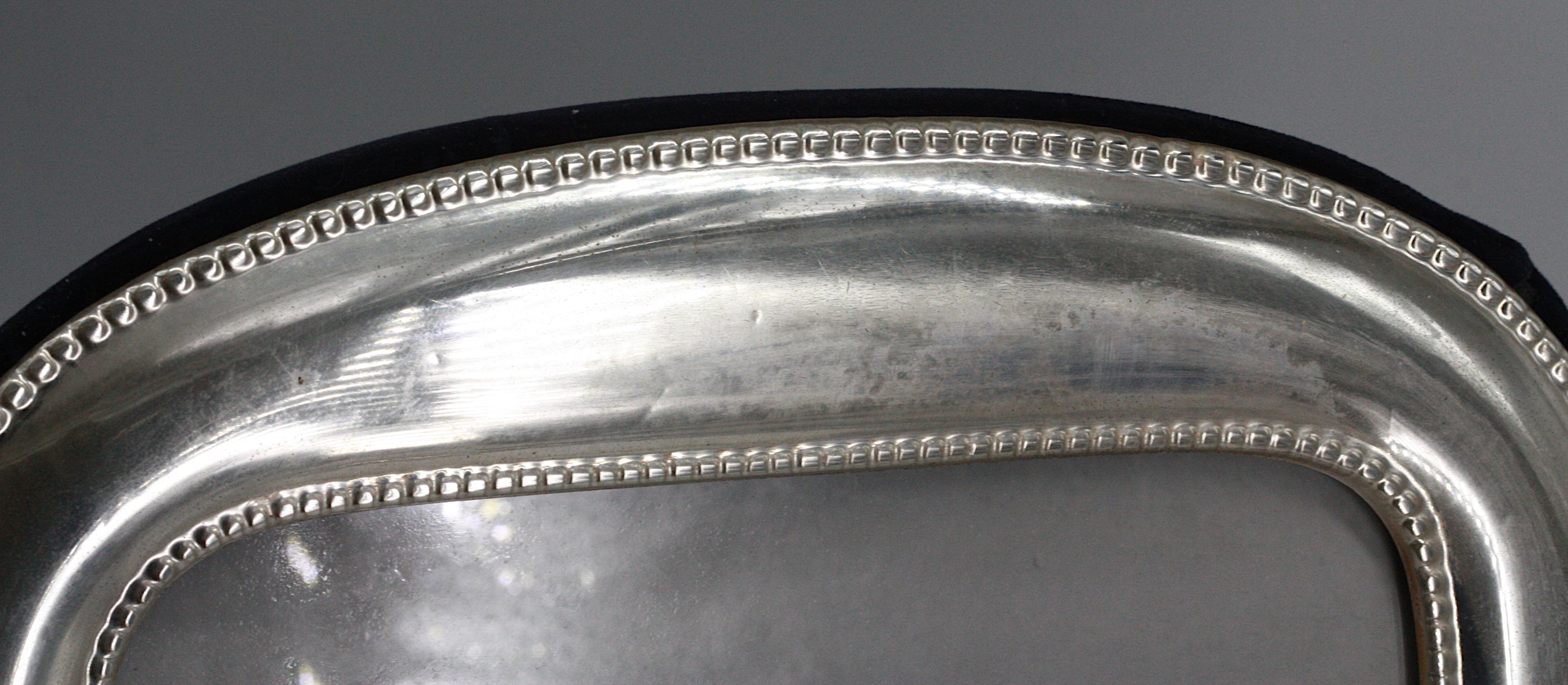 
American Sterling Silver Picture Frame
Wallace Silversmiths, appears unmarked.
Overall 9.5 by 7 in.
Condition Report
Good condition