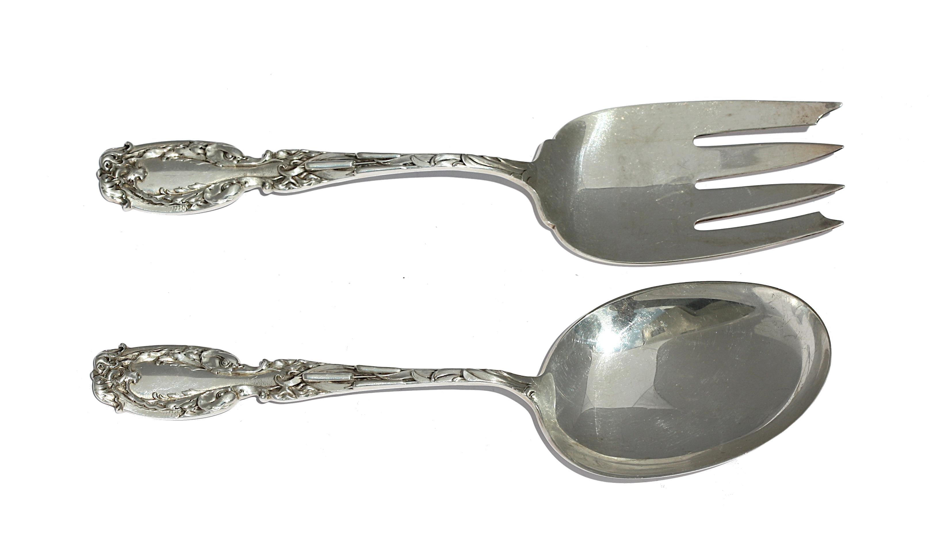 
American Sterling Silver Salad Fork and Spoon
Frank M. Whiting Co., marked Sterling and with manufacturing logo. Each handle chased with foliage and a cattail.
Length 9 in. (22.86 cm.), 7.2 ozt.