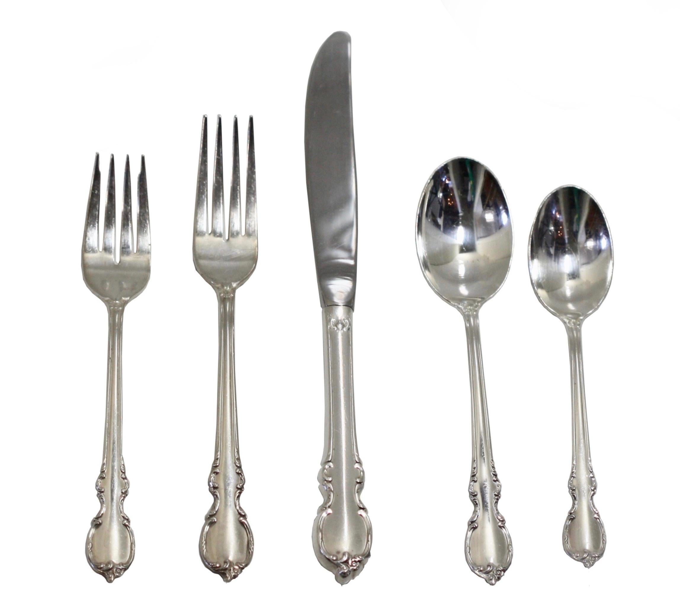 
American Sterling Silver Sixty-Six Piece Part Flatware Service 
Wm. Rogers, Sterling. In the Reflections pattern. Comprising, eleven dinner knives, twelve dinner forks, twelve salad forks, thirteen soup spoons, eleven teaspoons, a butter spread, a