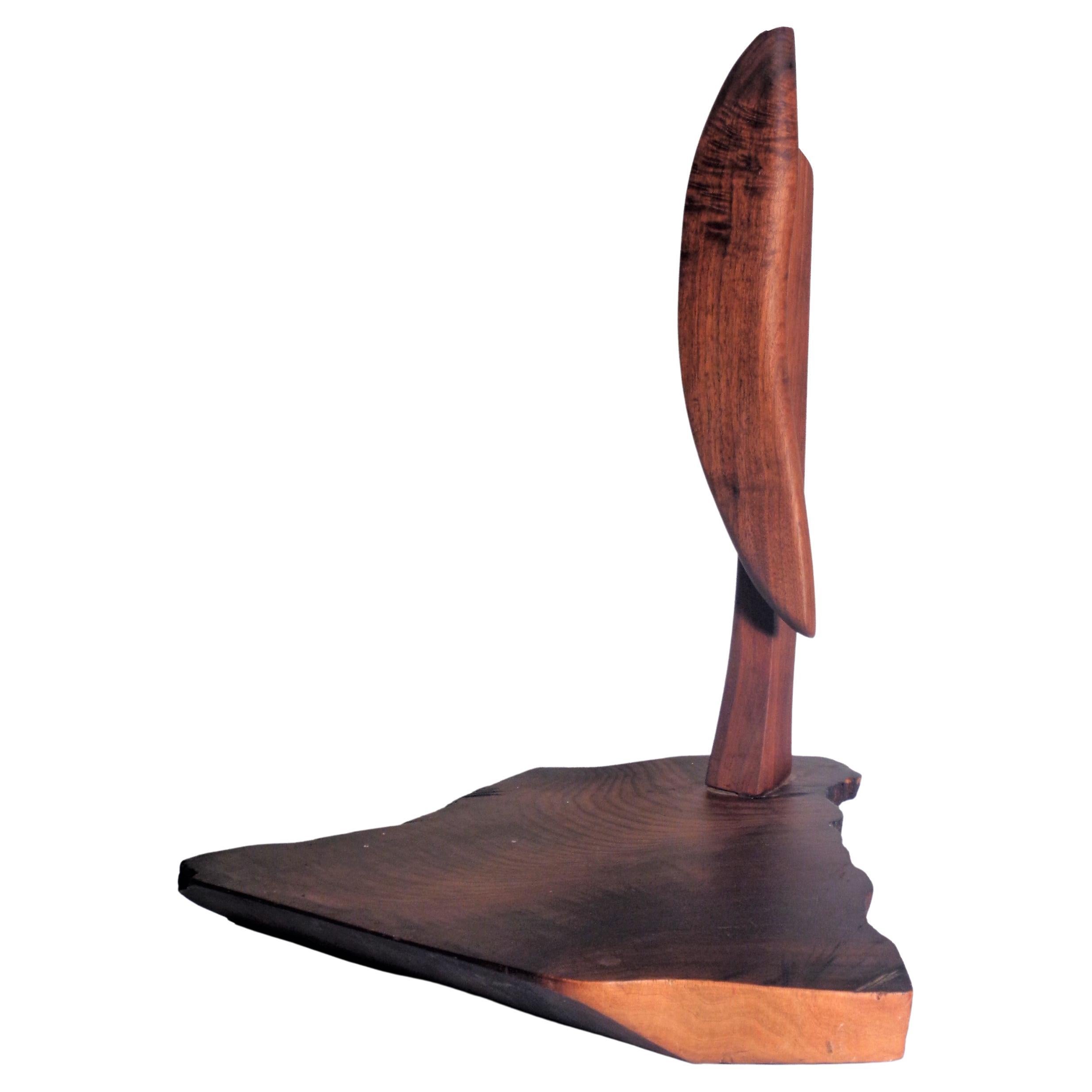 American studio craft movement abstract carved wood sculpture. Minimalistic bust ( head and neck ) set into free form rough cut beautifully figured wood base. Attributed to well renowned American artist sculptor Margery Goldberg ( b. 1950 ) founder