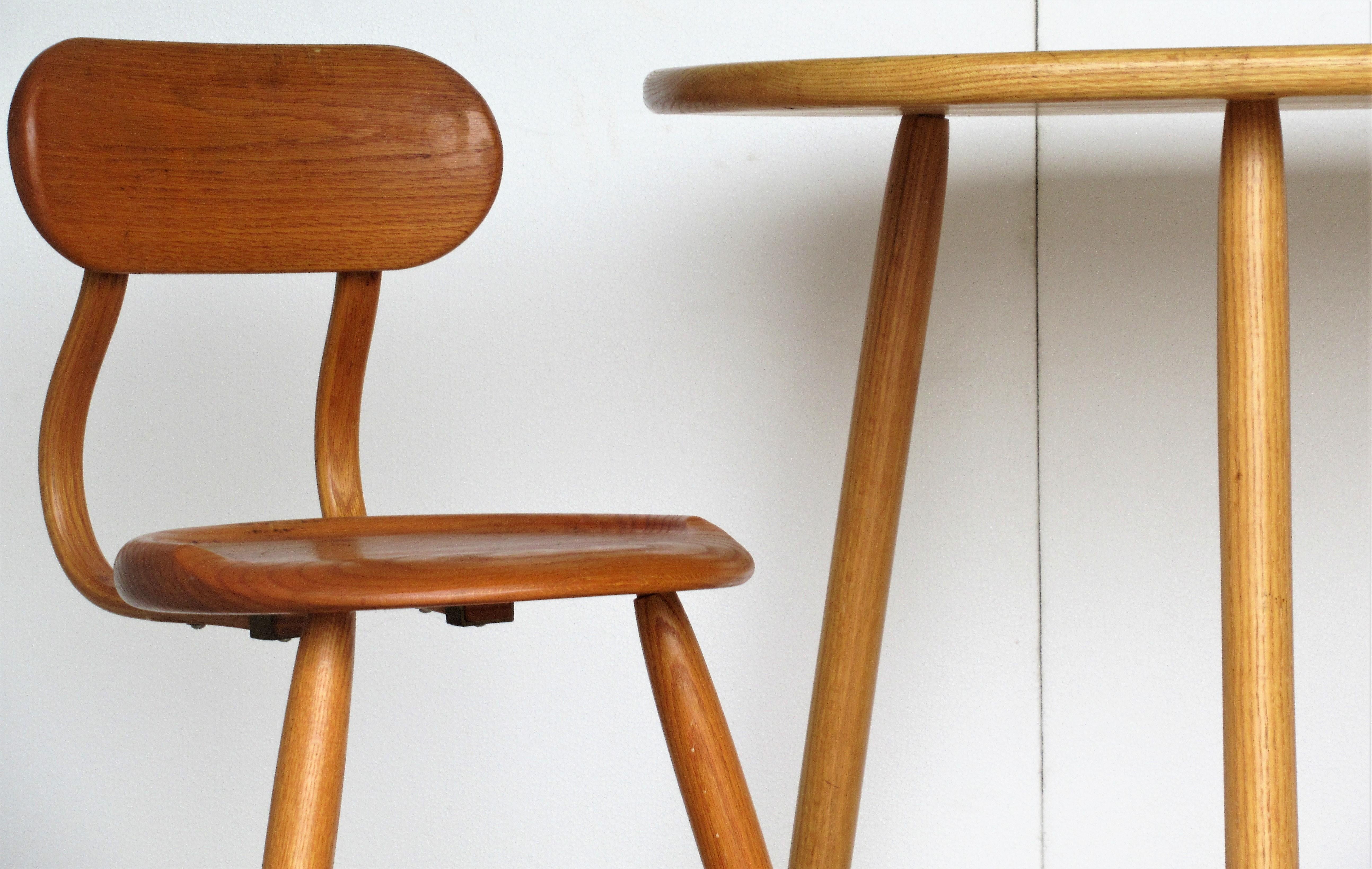 A pair of handcrafted wood bar height stools with removable backs and a rare complimenting table by Kai Pedersen - Lancaster Pennsylvania. Table and stools are incise carved signed into wood on the underside Kai Pedersen Woodworking - 1987 copyright