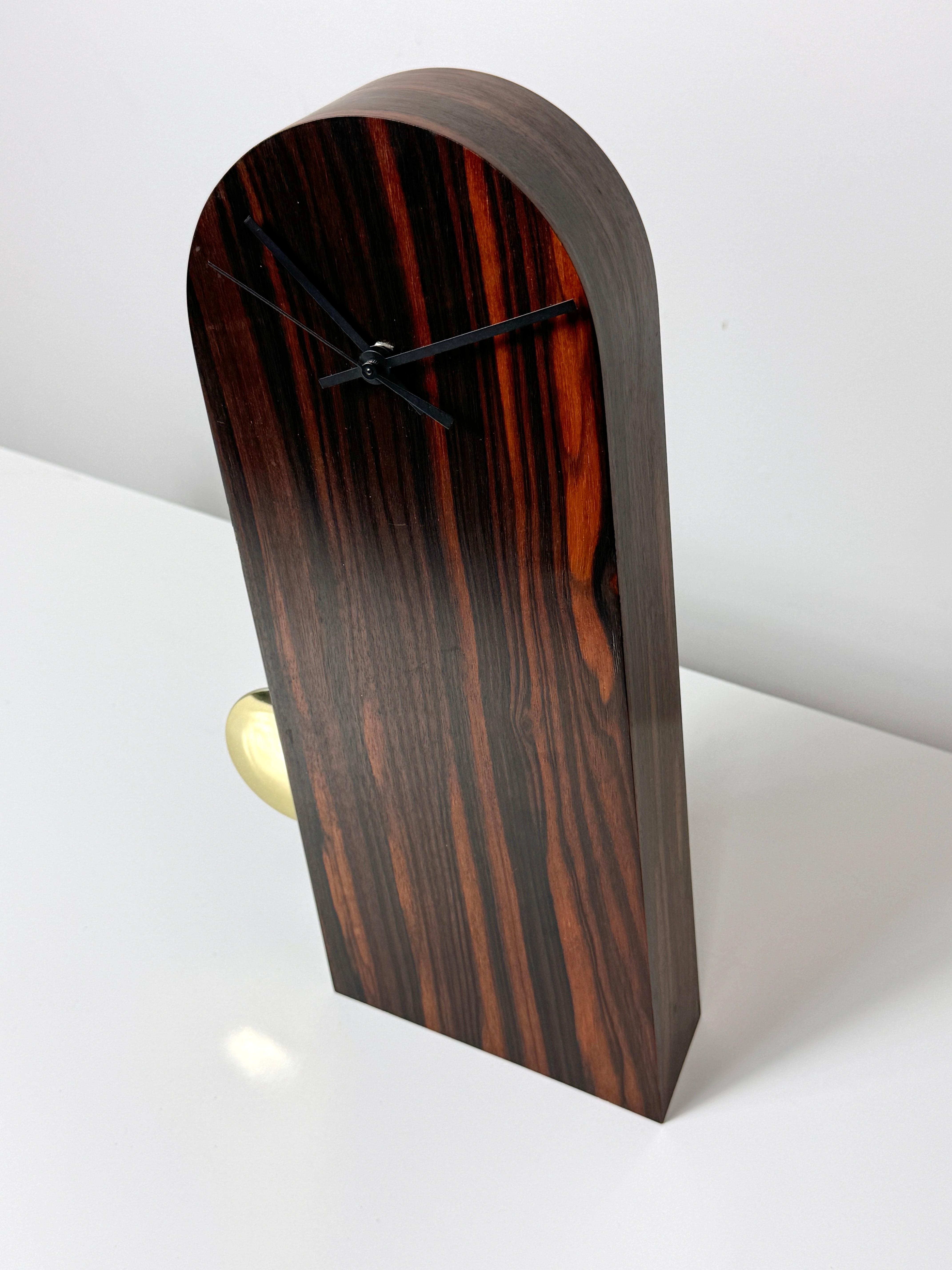 Mid-Century Modern American Studio Craft Sculptural Ebony Tilt Pendulum Clock by Thomas Stender