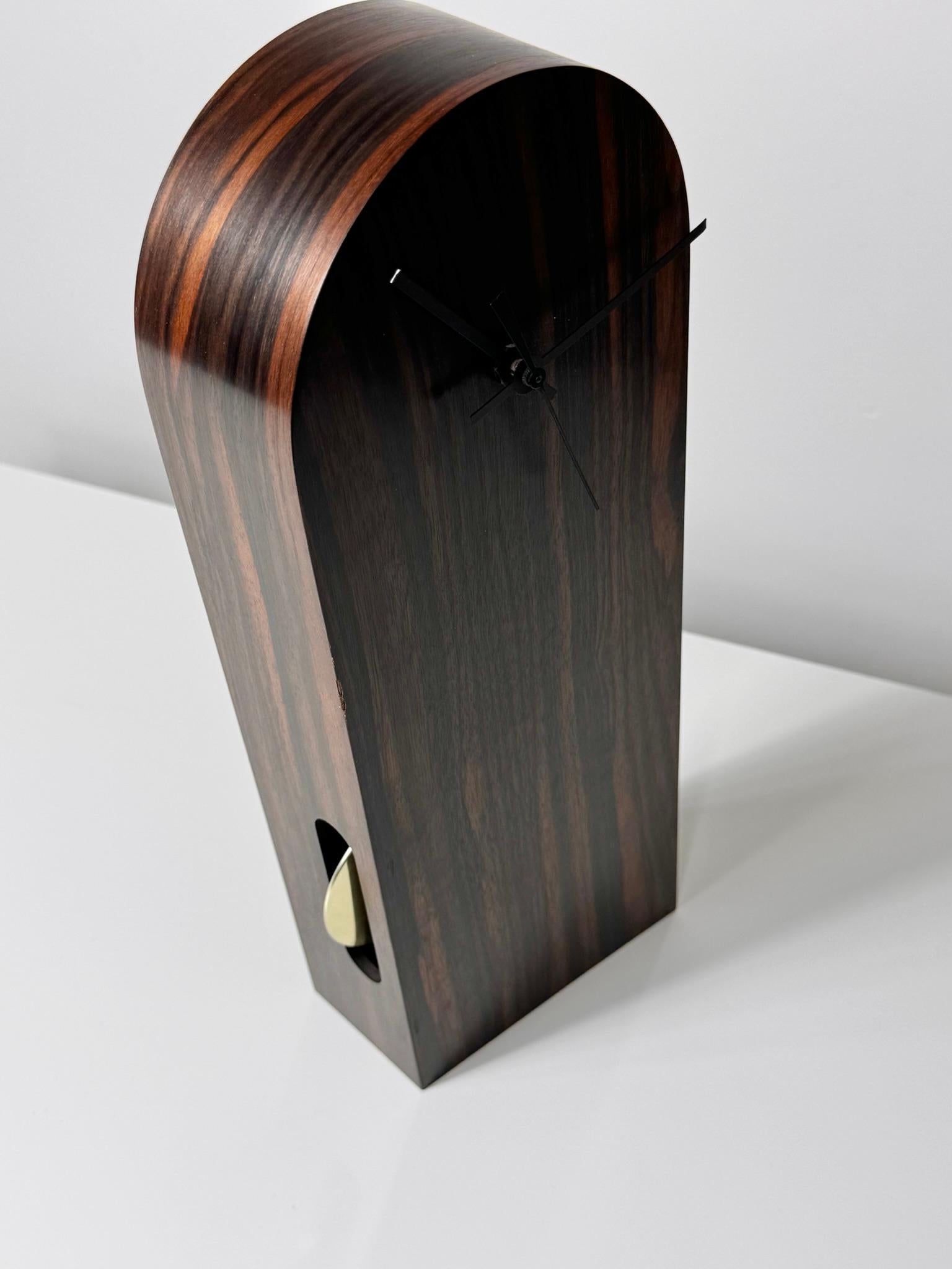 Late 20th Century American Studio Craft Sculptural Ebony Tilt Pendulum Clock by Thomas Stender