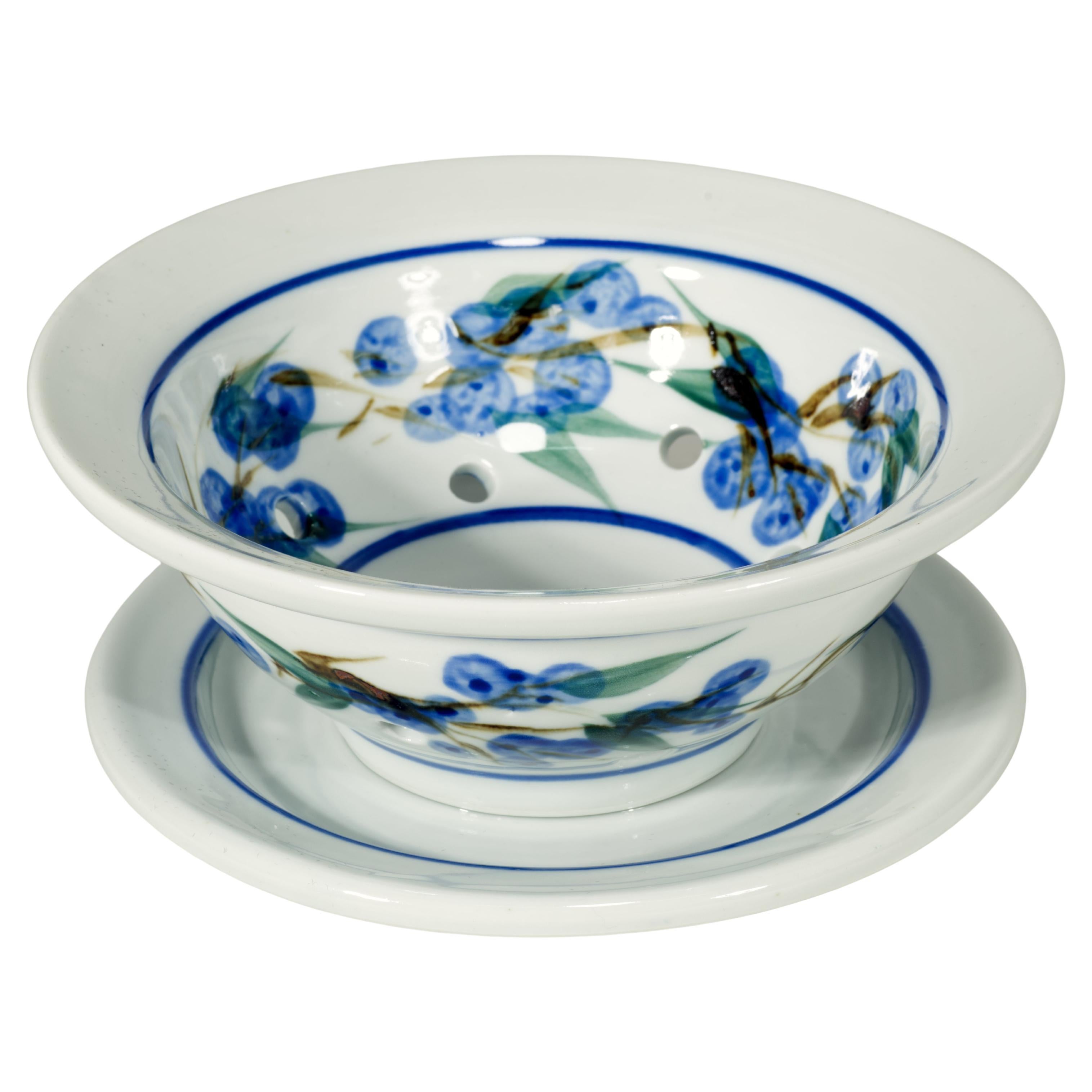 What is the historical significance of blue and white in ceramics?