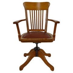 Antique American swivel office armchair in oak, with leather seat, USA, Circa 1900
