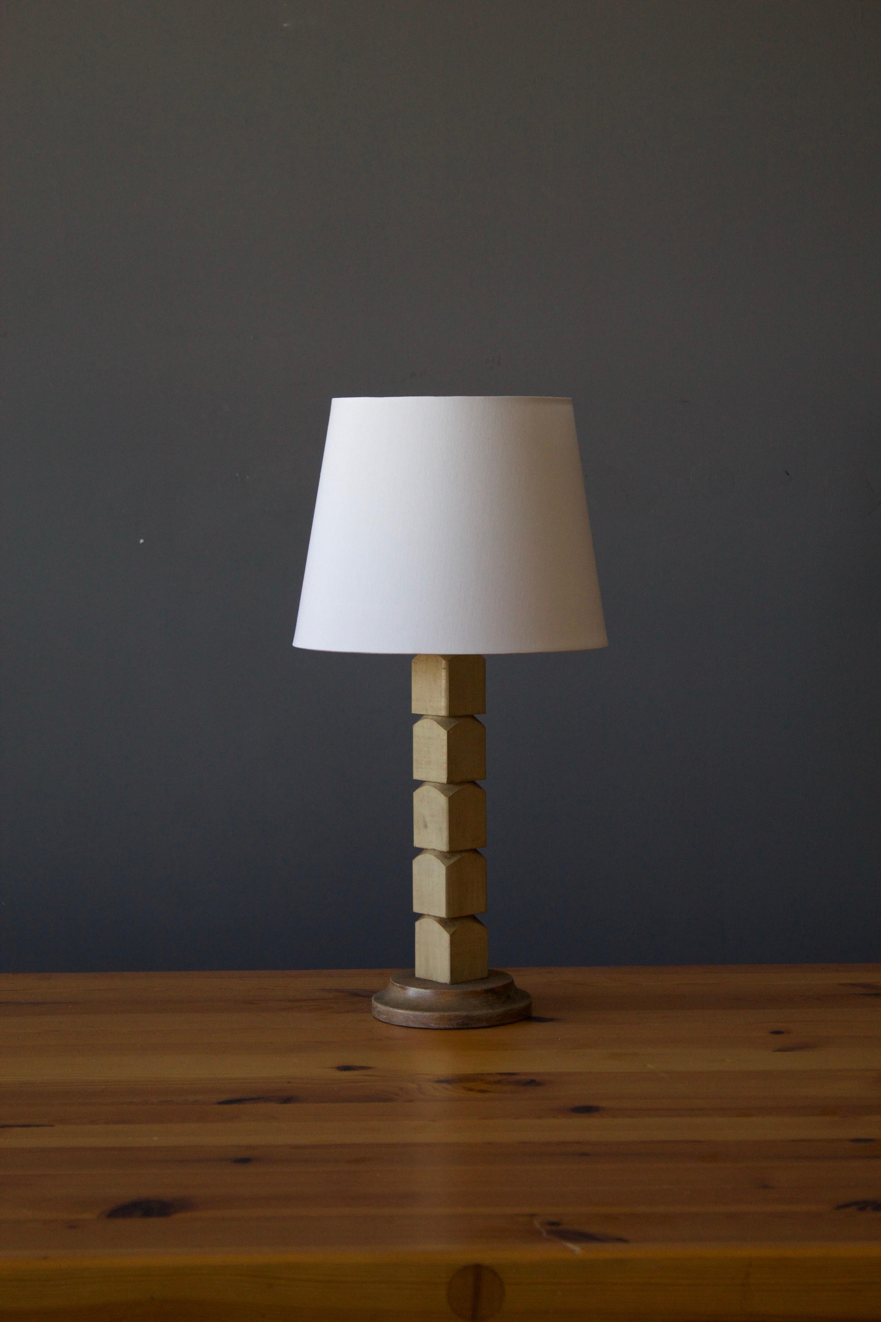 A table lamp. Designed and produced in America, c. 1950s. In solid cerused wood.

Sold without lampshade. Stated dimensions excluding bulbs and lampshade.

Other designers of the period include Alexandre Knoll, George Nakashima, Isamu Noguchi,
