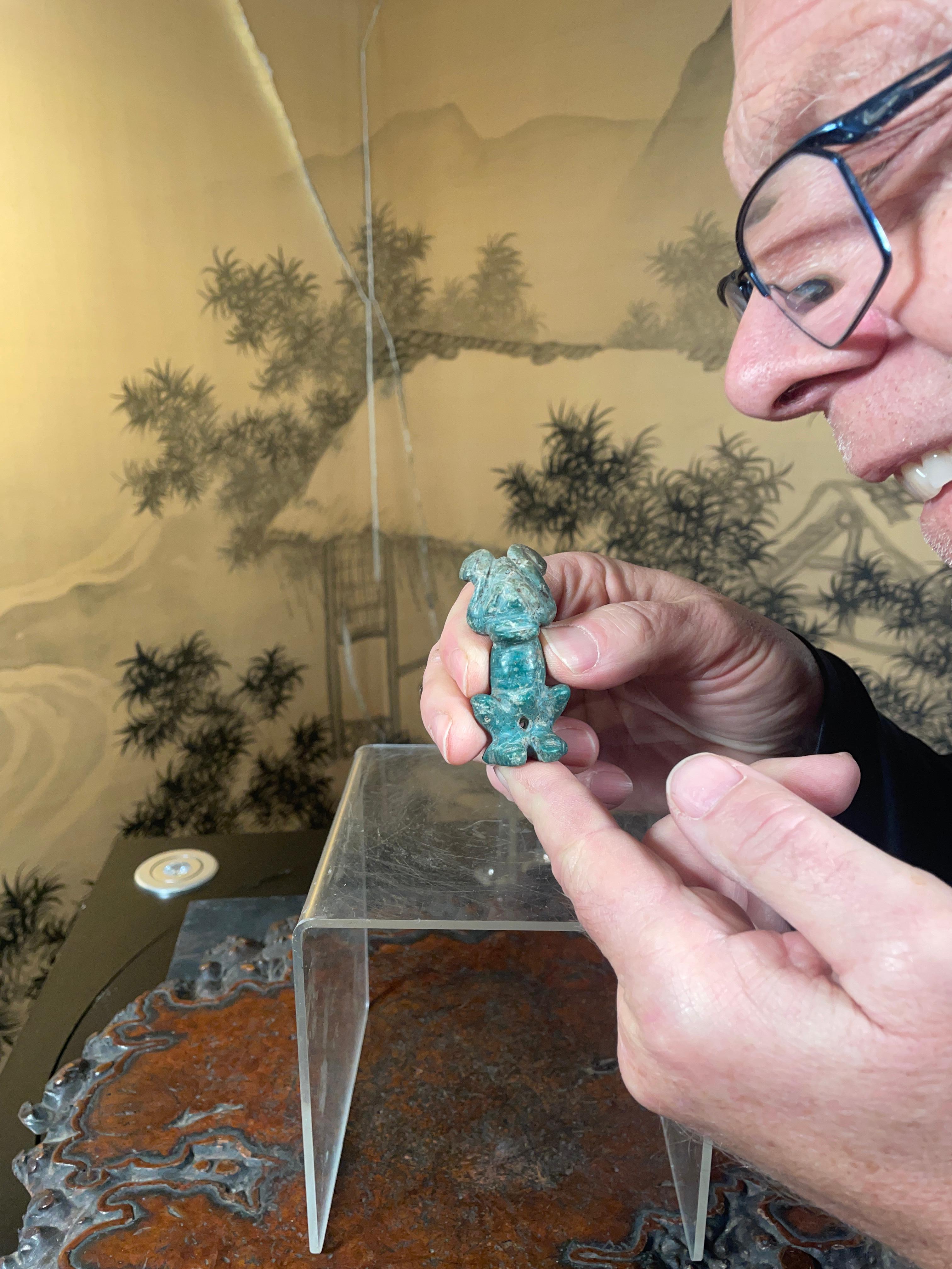 Pre-Columbian, Hispaniola, Arawak peoples, Taino native Indians

Rare blue green colored jade with original old pierced holes for a pendant mount

Taino Jade Anthropic male 