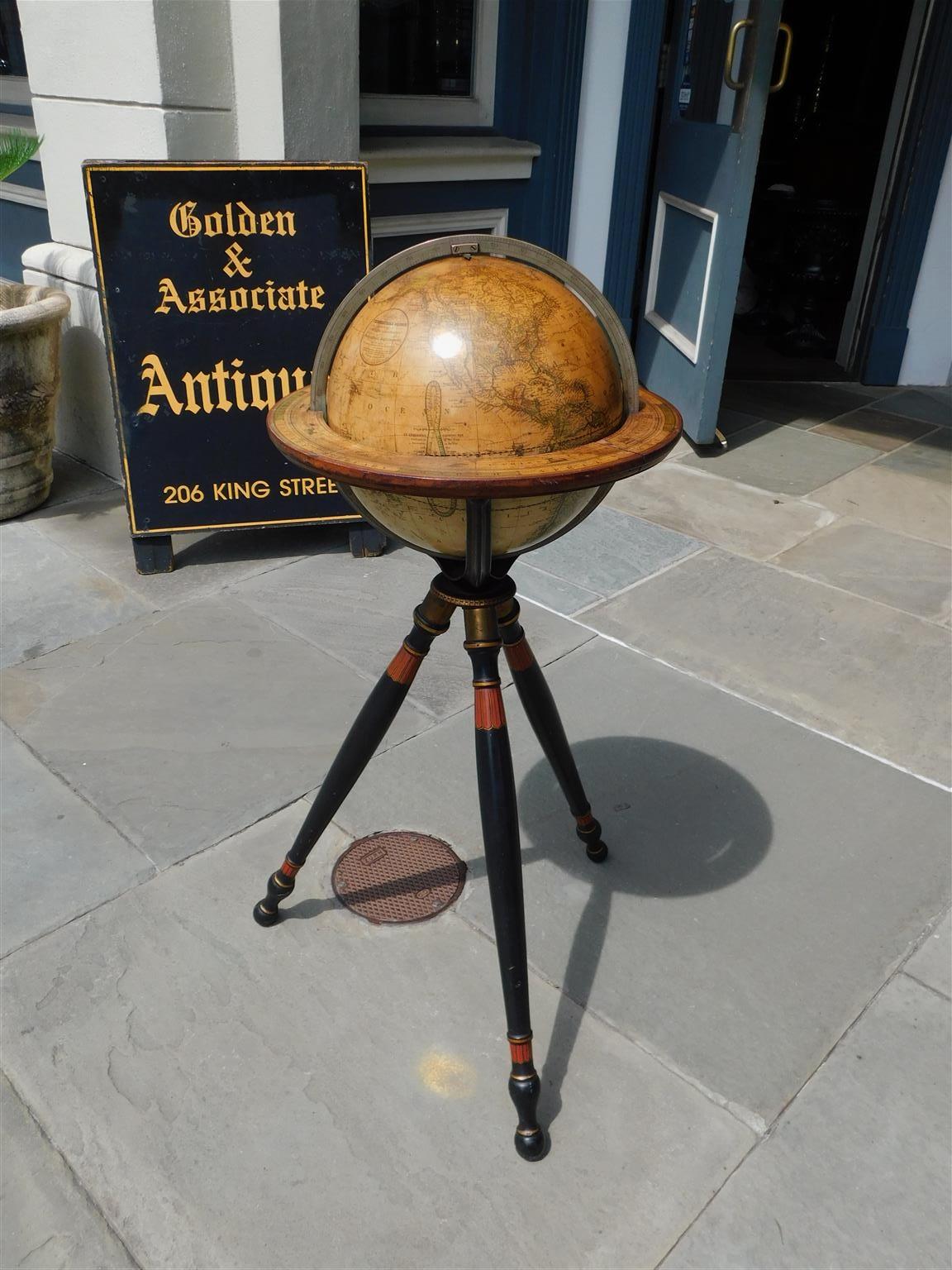 American Terrestrial Brass Meridian Globe mounted on a turned bulbous gilt ringed and red stenciled tripod stand, Gilman Joslin, Boston. Mid 19th Century
Globe is 39