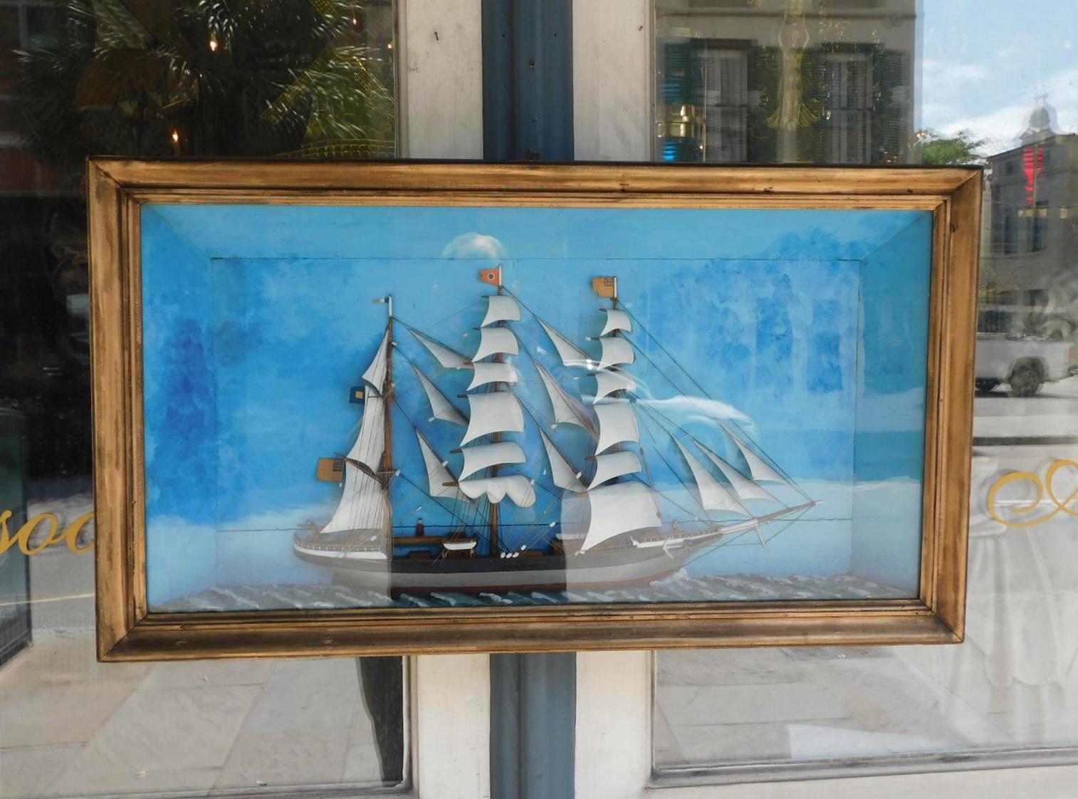 American three masted clipper ship diorama under glass in shadow box gilt frame. Mid-19th century.
