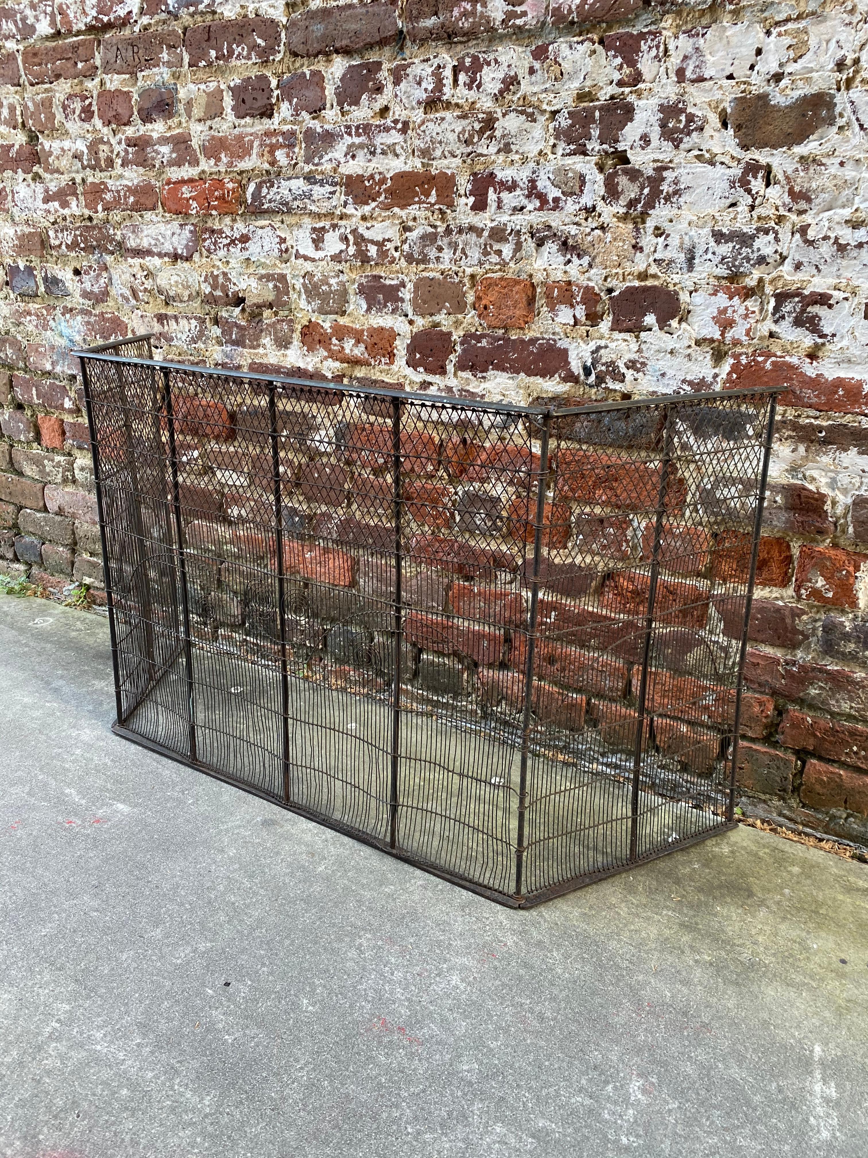 American three-panel folding fire screen, circa 1810. Top brass rail with three wire panels with wire work woven into screen.