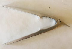 American Trench Art Aluminum Stylized Carved Aluminum Figural Nutbird Nutcracker