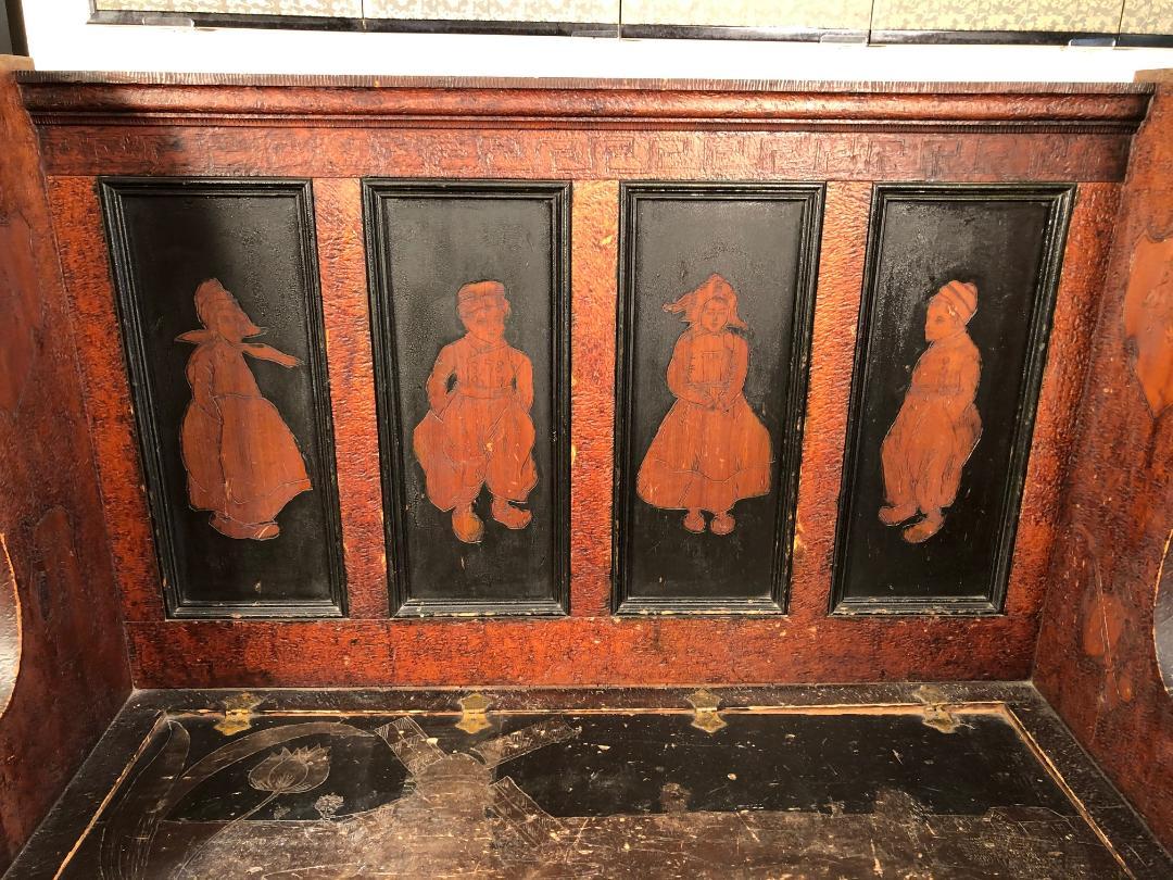 This is a unique and original beautifully hand-incised hand painted settle or bench signed and dated 1905. This unique work of art is hand-incised using a pyrographic (pyrography) wood burned technique and then hand stained/painted on front with