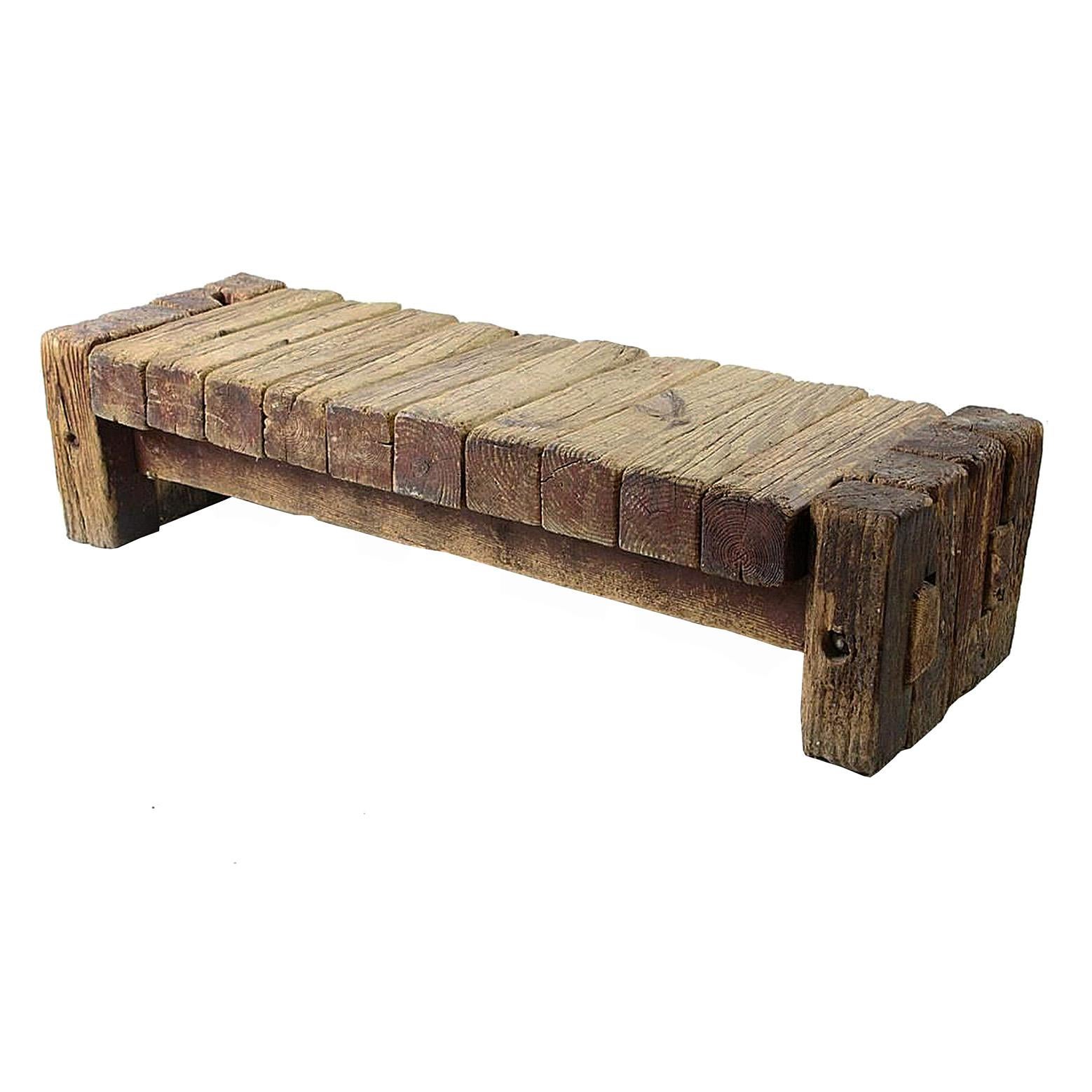 bench made out of logs