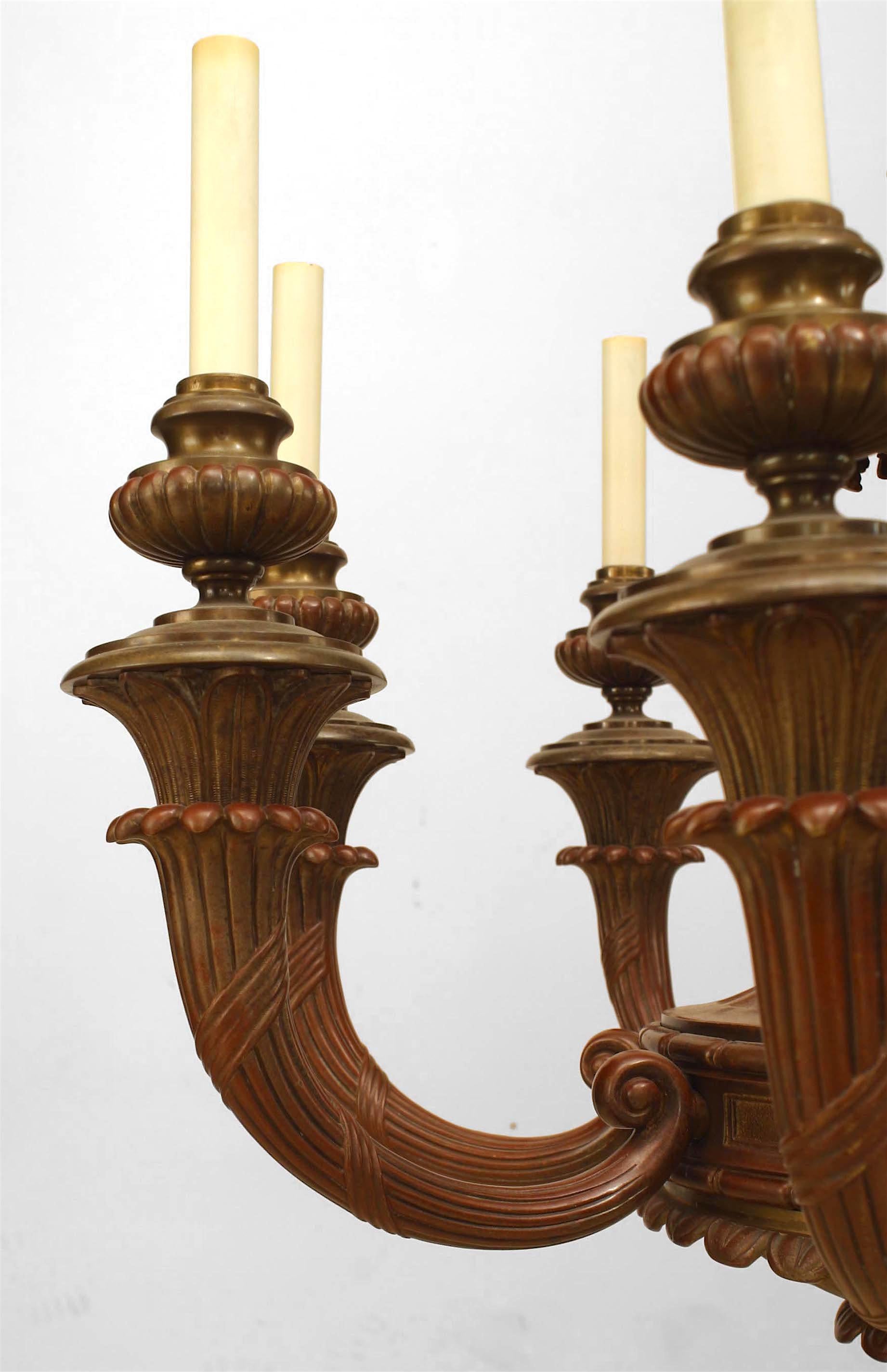 American Victorian (19th-20th century) painted bronze eight-light chandelier with scrolling fluted arms.
 
