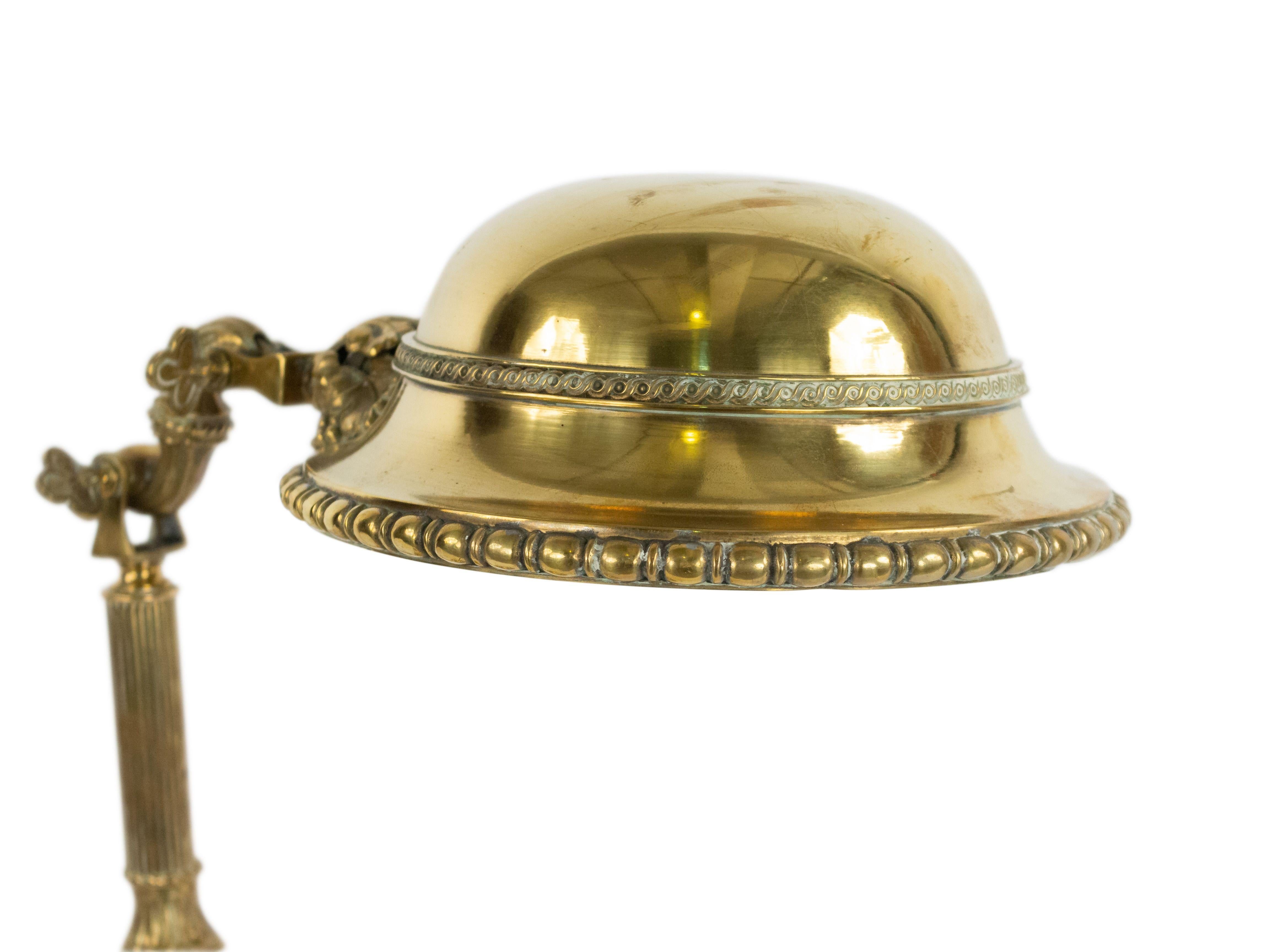 Gorham American Victorian brass single arm student lamp with adjustable dome shaped shade.