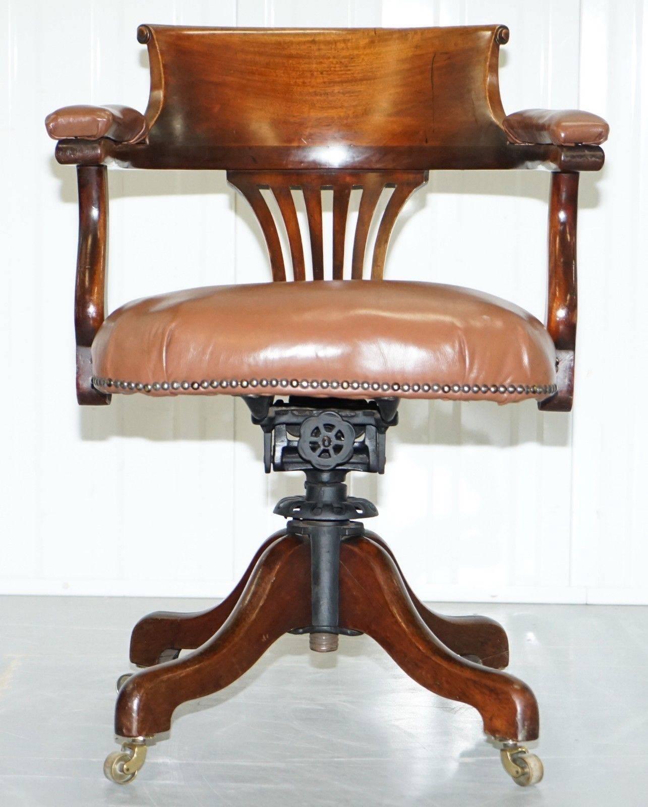 We are delighted to offer for sale this very nice aged brown leather American Victorian office captains chair with early original swivel movement

The chair has a lovely industrial look and feel to the frame mechanism, its all solid steel, hand