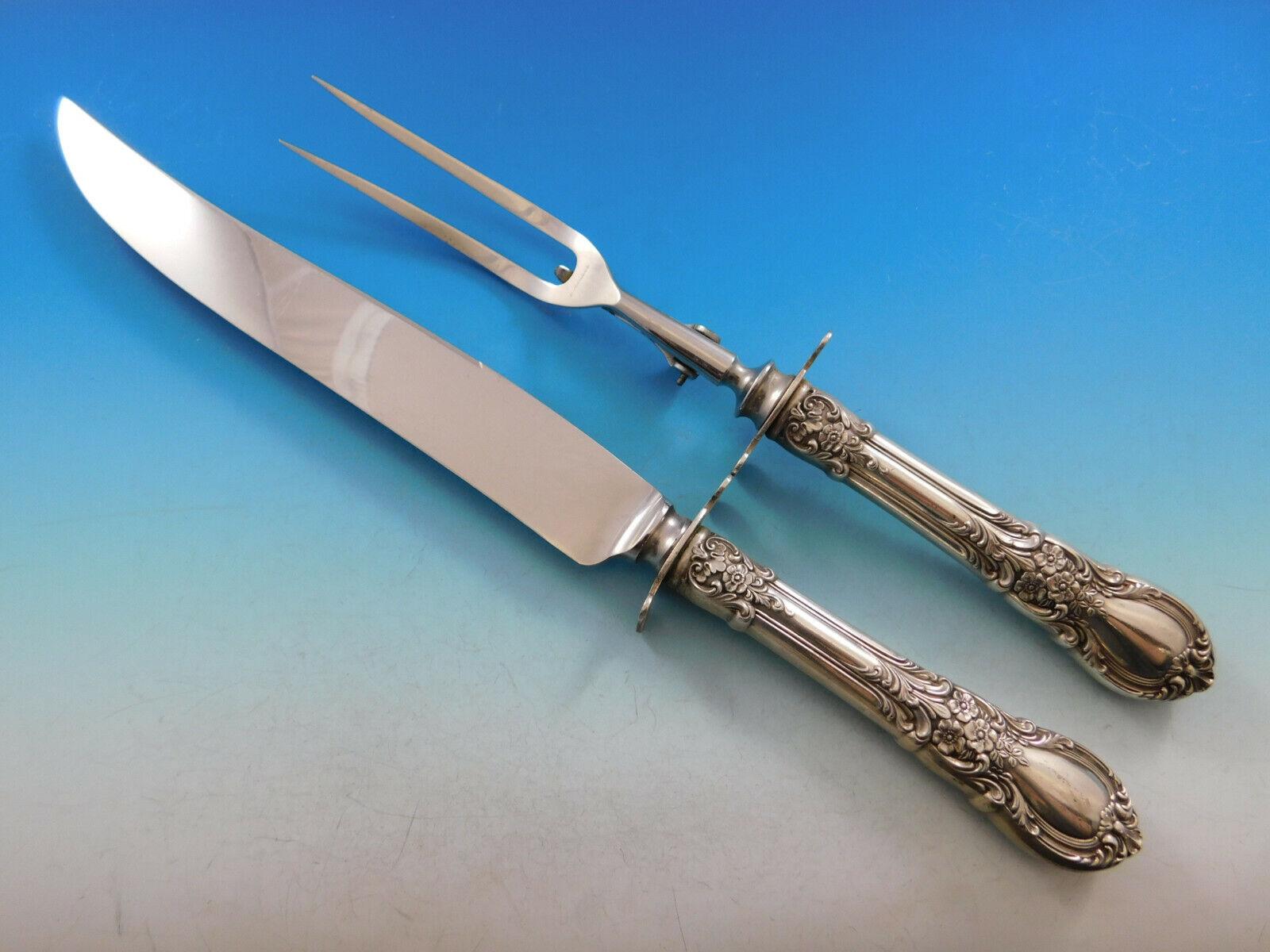 Service de couverts en argent sterling American Victorian by Lunt - 59 pièces. Cet ensemble comprend :

8 couteaux, 8 5/8