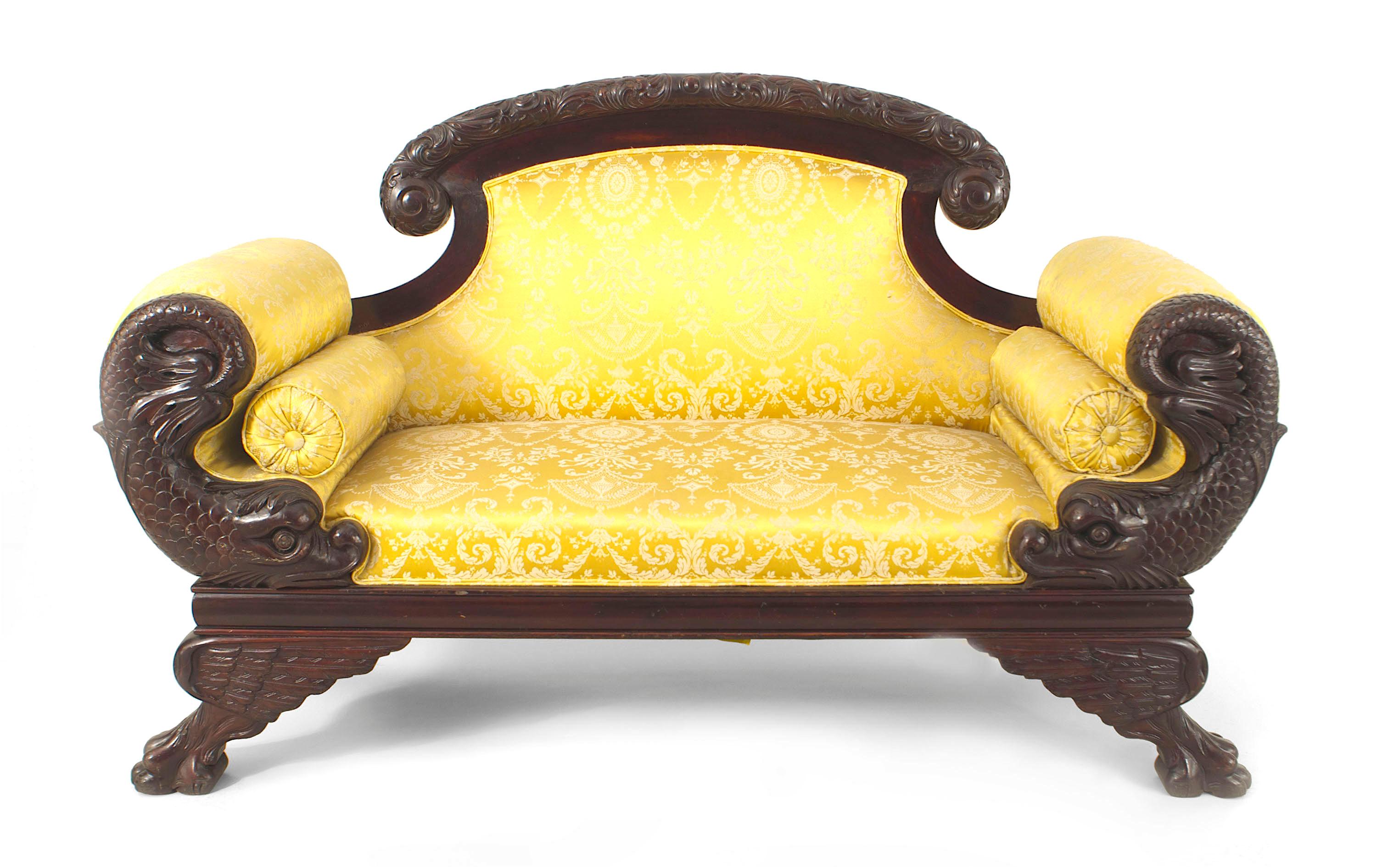 American Victorian mahogany carved dolphin-side roll arm loveseat with gold upholstery
