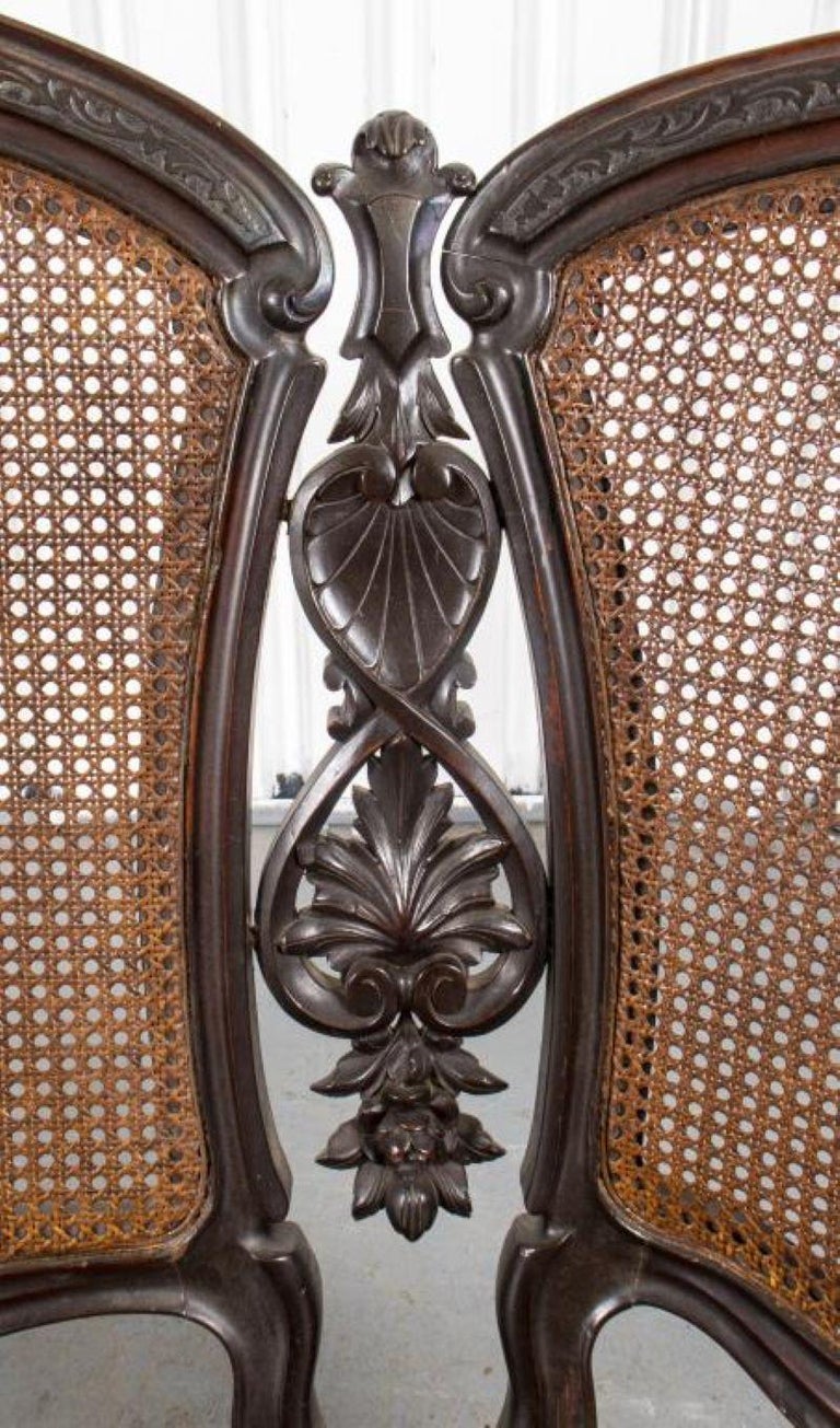 American Victorian Carved Wood Caned Settee For Sale at 1stDibs