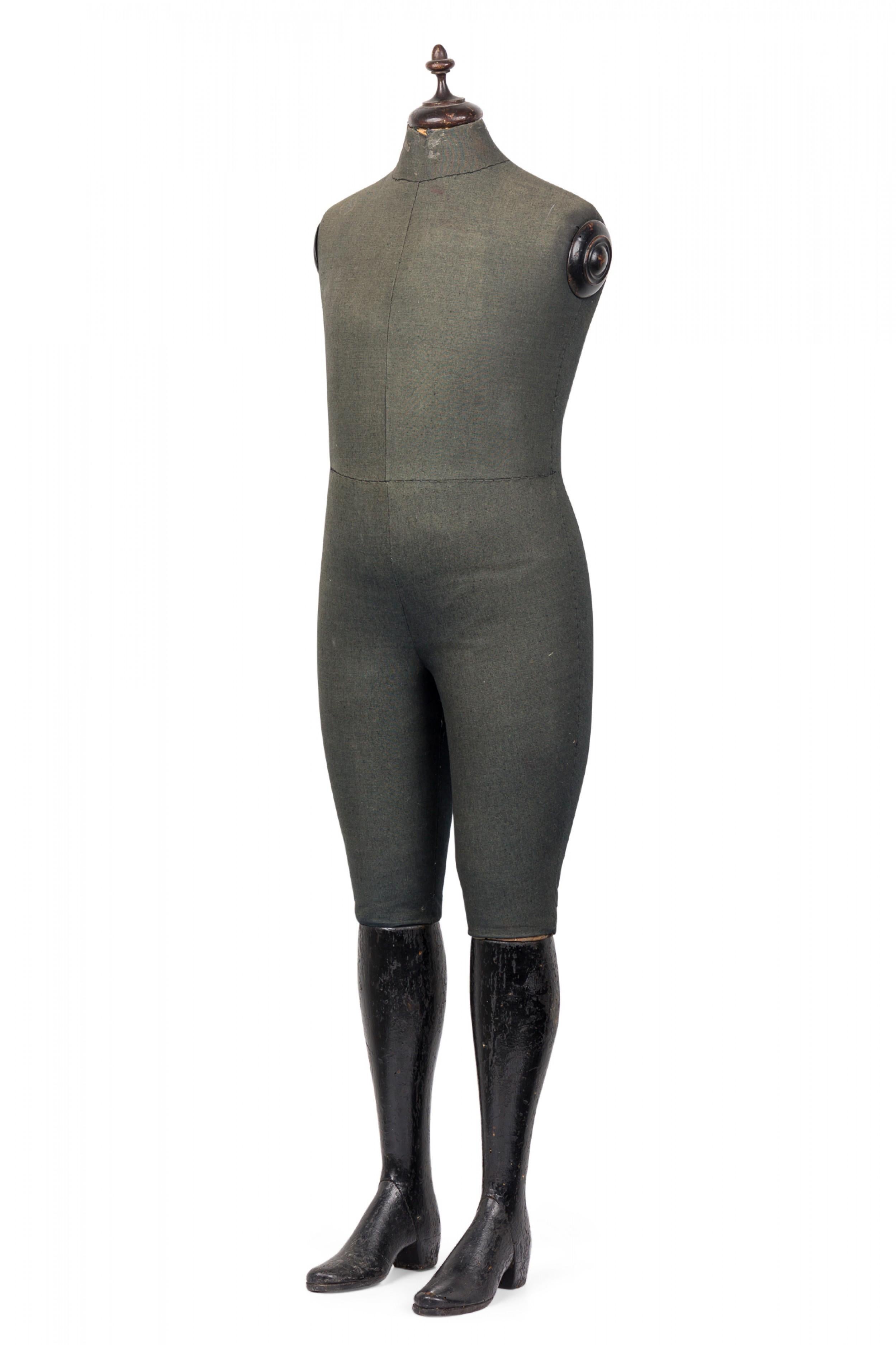American Victorian style life size child mannequin with metal shoes and black upholstery (19/20th Cent)