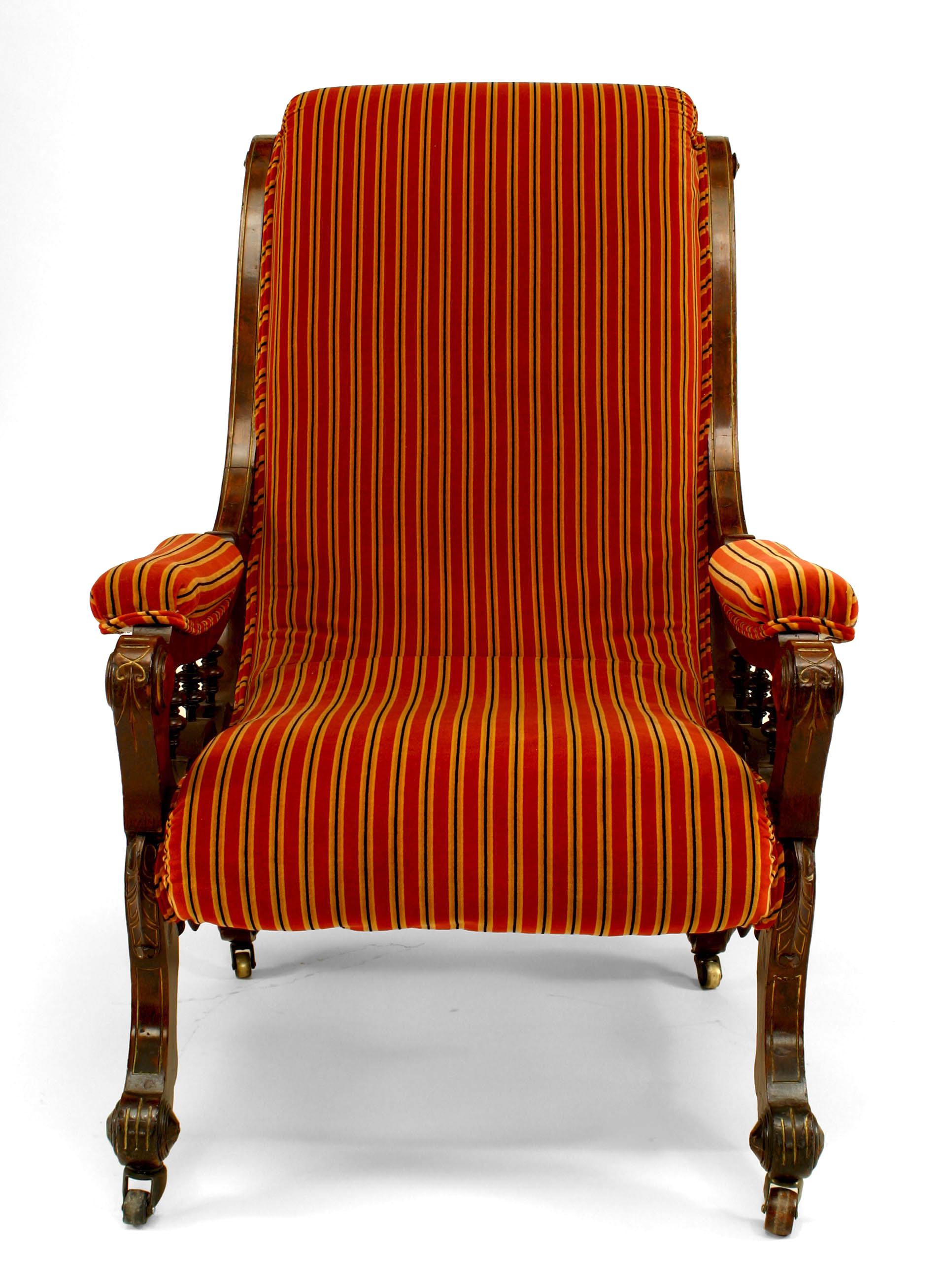 American Victorian Eastlake-style burl walnut and gilt trimmed sleigh back armchair with striped rust colored upholstery. (Signed: HOSTATTER, Pat Pending, 4/3/1877)
