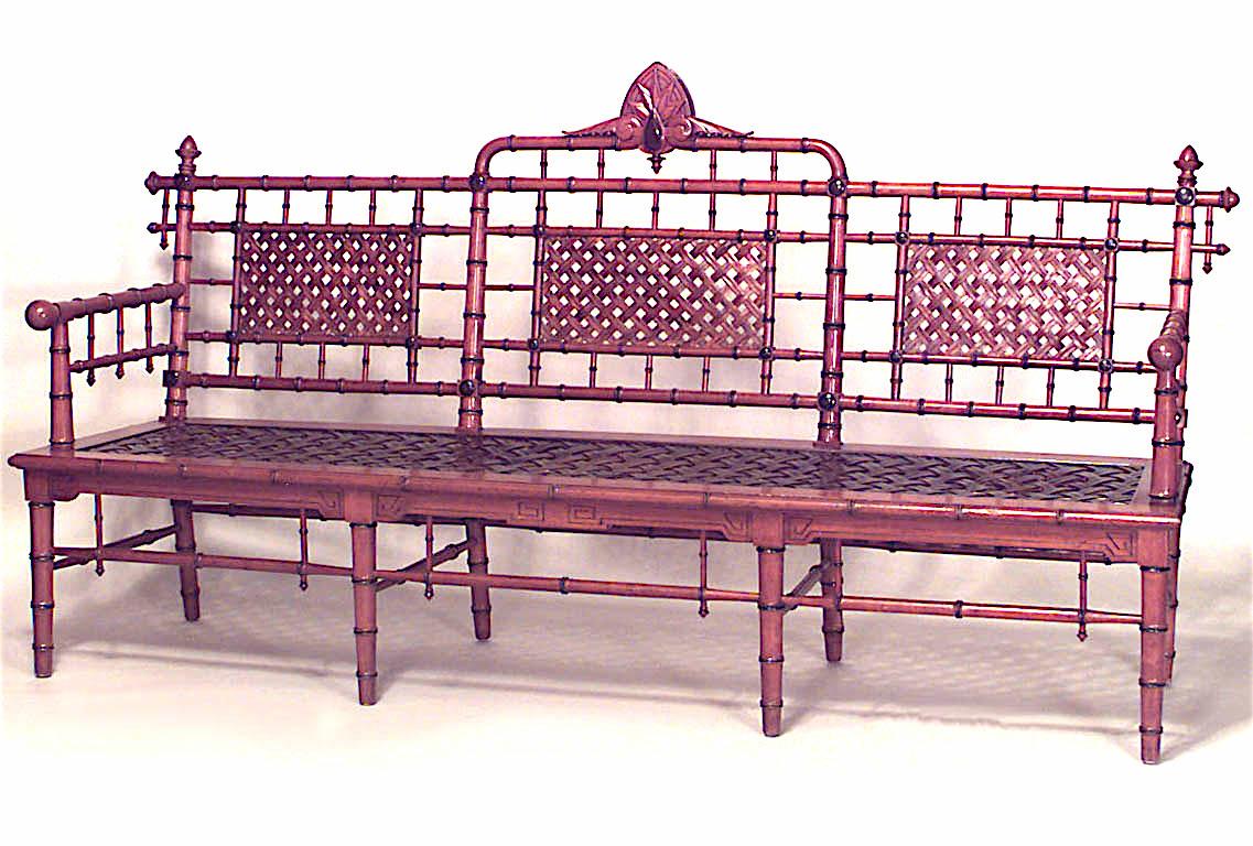 American Victorian faux bamboo mahogany settee with spindle trim and cross thatched seat with 3 inset panels in back. (att: Hunzinger)
