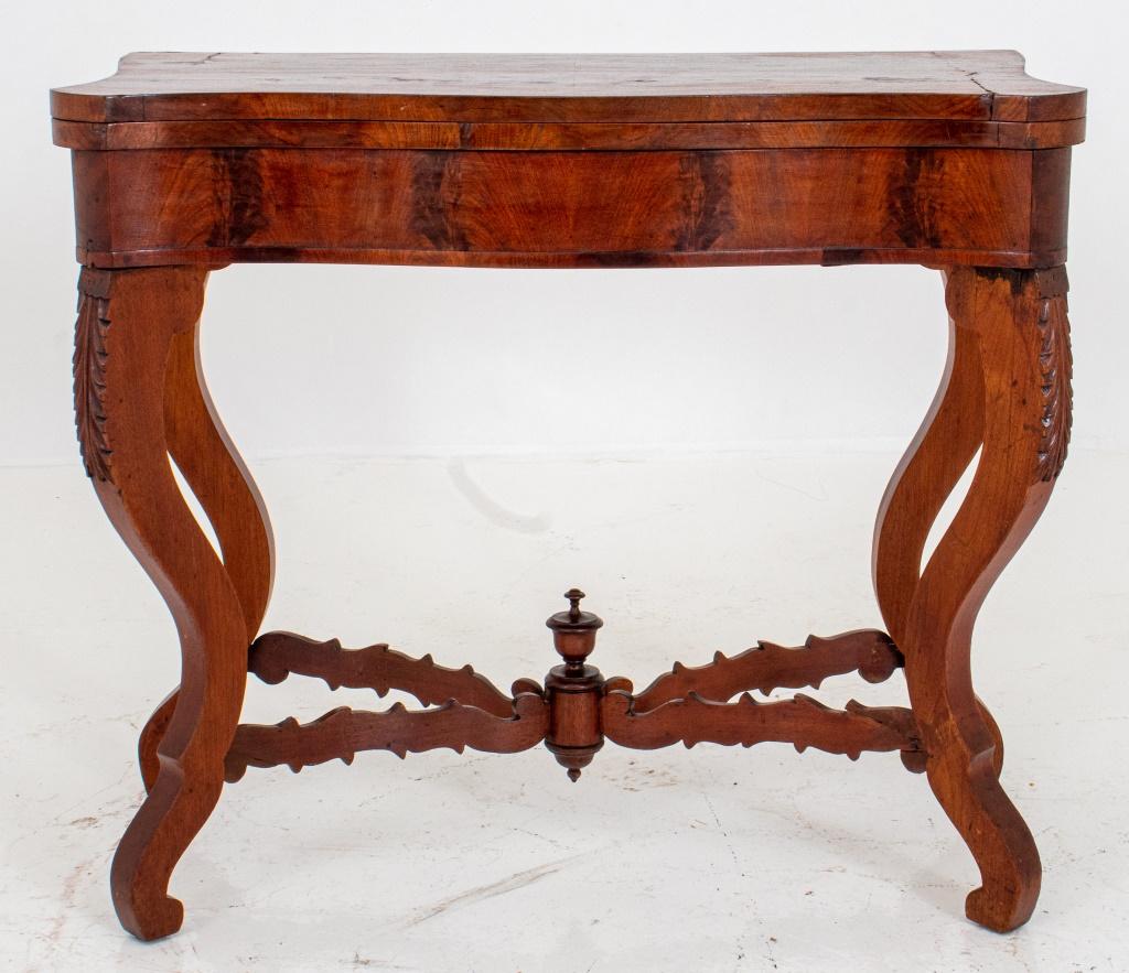 American Victorian mahogany veneer console game table with flip top and carved scroll legs. Measures: 30.5