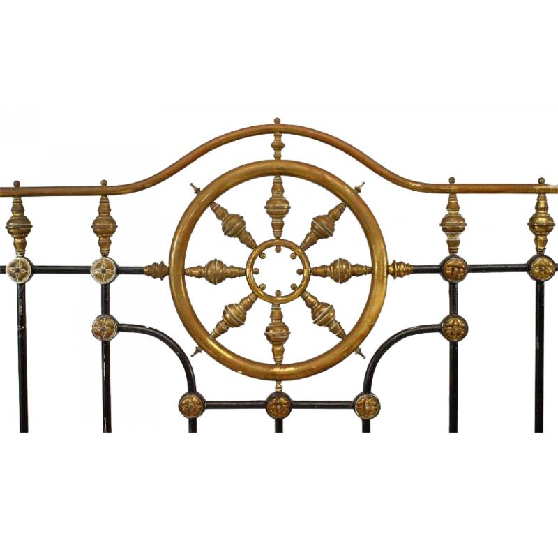American Victorian black painted full size bed with brass wheel design (includes: headboard, footboard, rails).