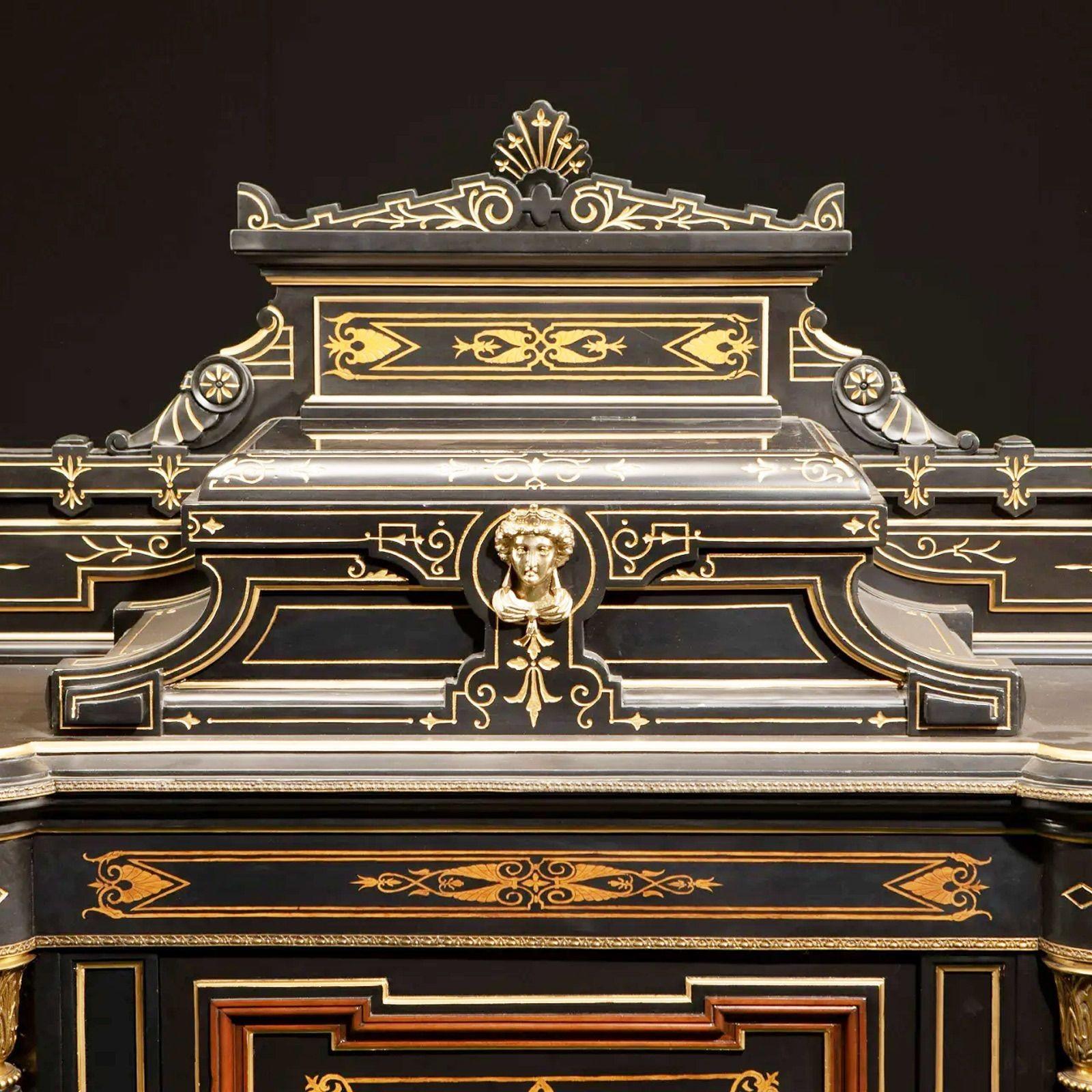 American victorian renaissance revival cabinet with over the top inlaid, Late 19th century

Ebonized walnut with marquetry inlay, gold enamel highlighted features, and patinated bronze mounts
 
Dimensions:

62
