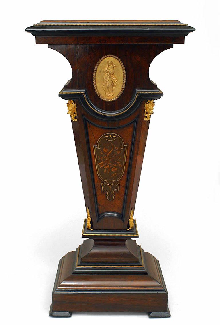 American Victorian rosewood and bronze dor√© trimmed rectangular pedestal with floral inlaid panel below an oval bronze medallion of female figure with fox head trim mounts.
