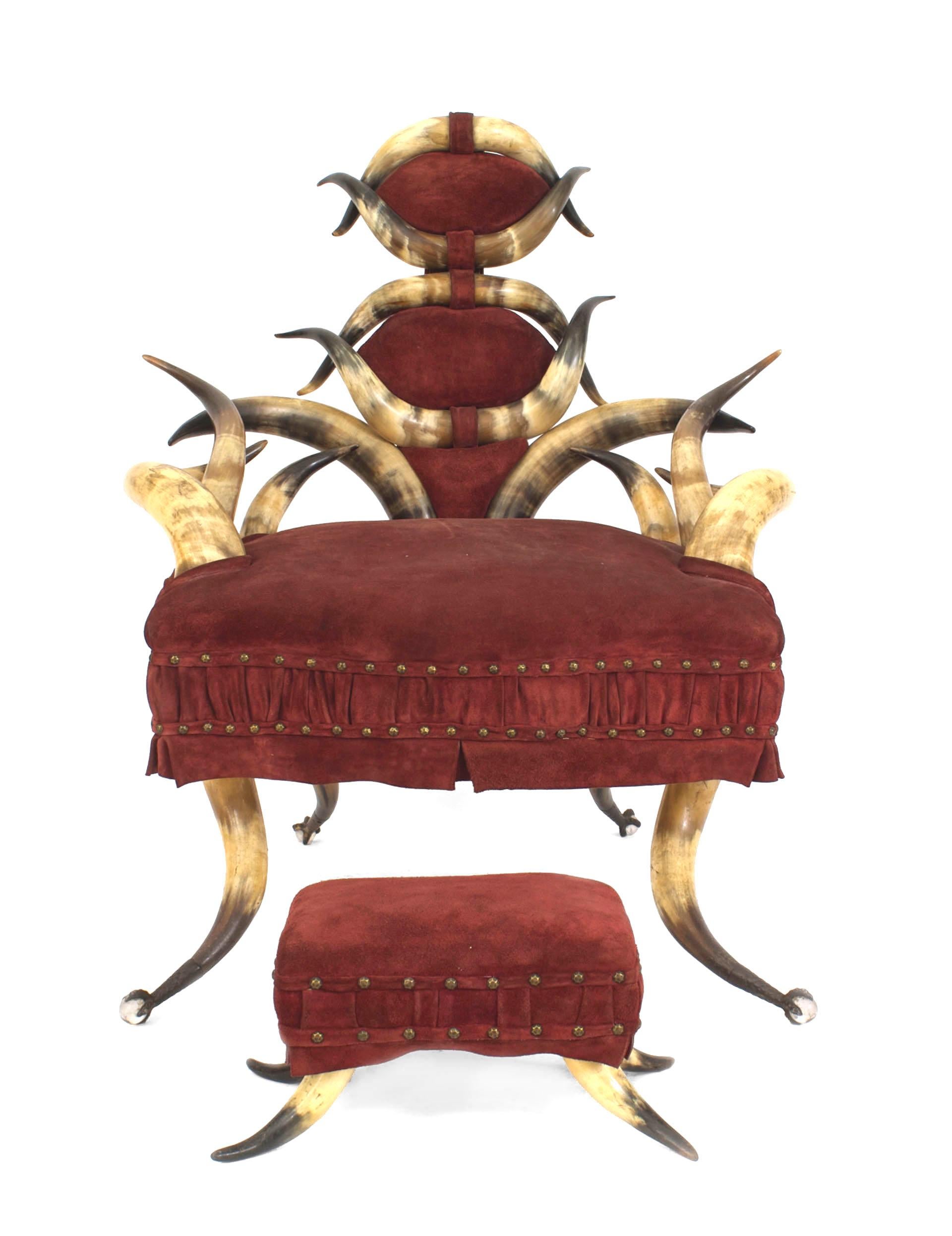 American Victorian steer horn arm chair with maroon velvet upholstered seat & back and metal claw feet holding crystal balls. Includes matching foot stool 17