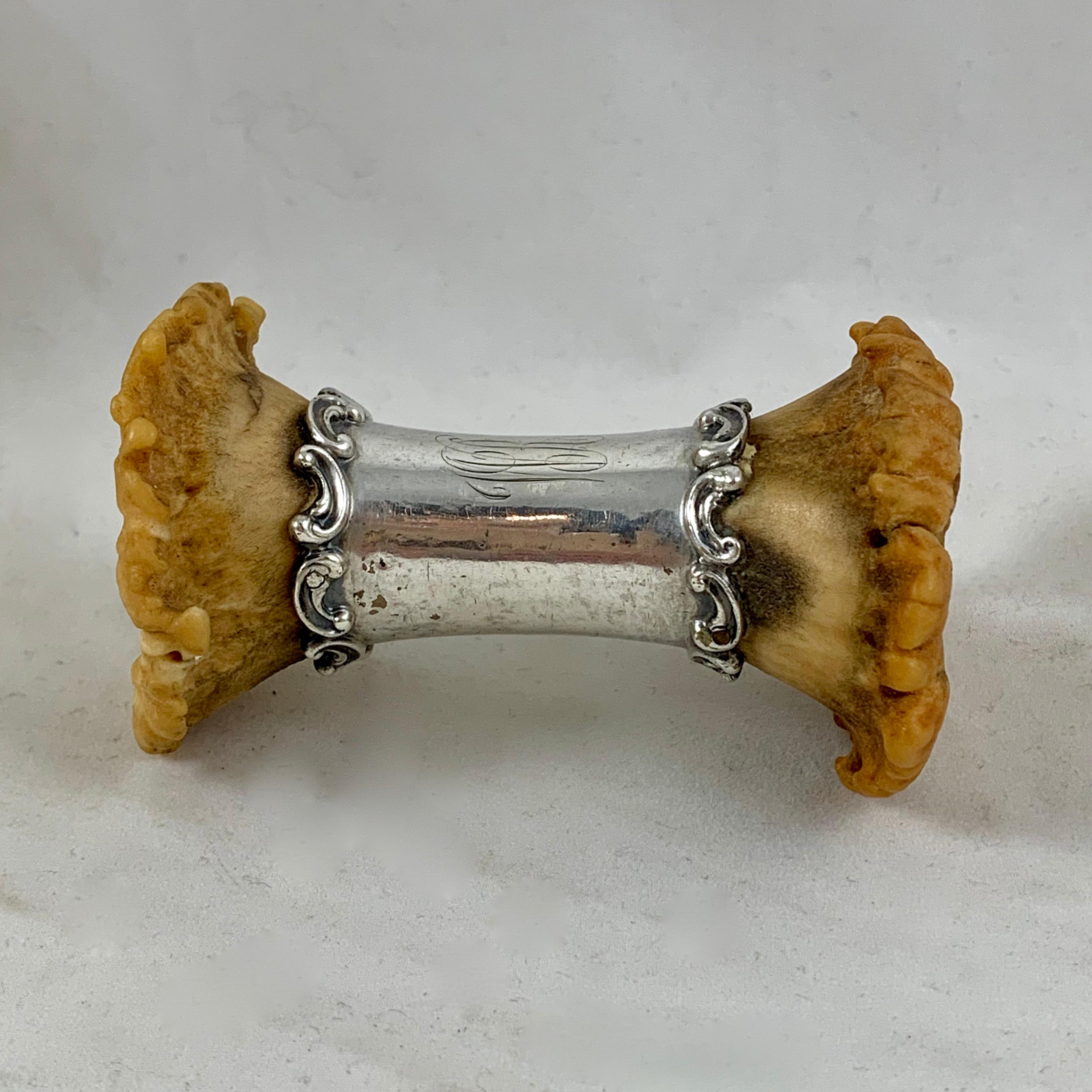 A one of a kind, American Victorian era carving knife rest made of Sterling silver and deer antler crowns, circa 1875-1880.

Most unusual, this piece is used at table for resting the blade of a carving knife, keeping the linen clean while carving