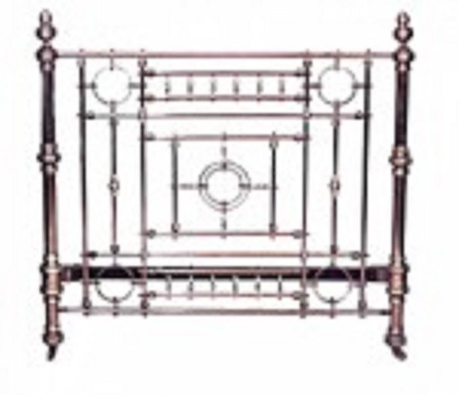 American Victorian-style brass full size bed of open spindle design and celadon colored button upholstered (includes: headboard, footboard, rails).
