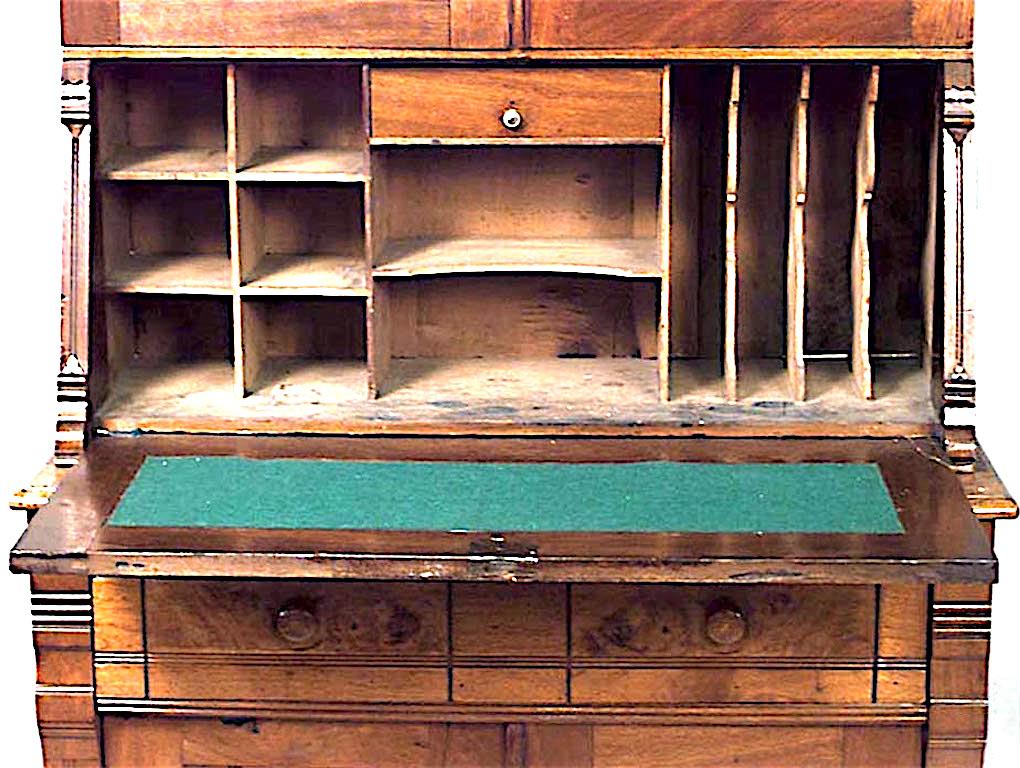 American Victorian walnut drop front secretary with two glass doors.
