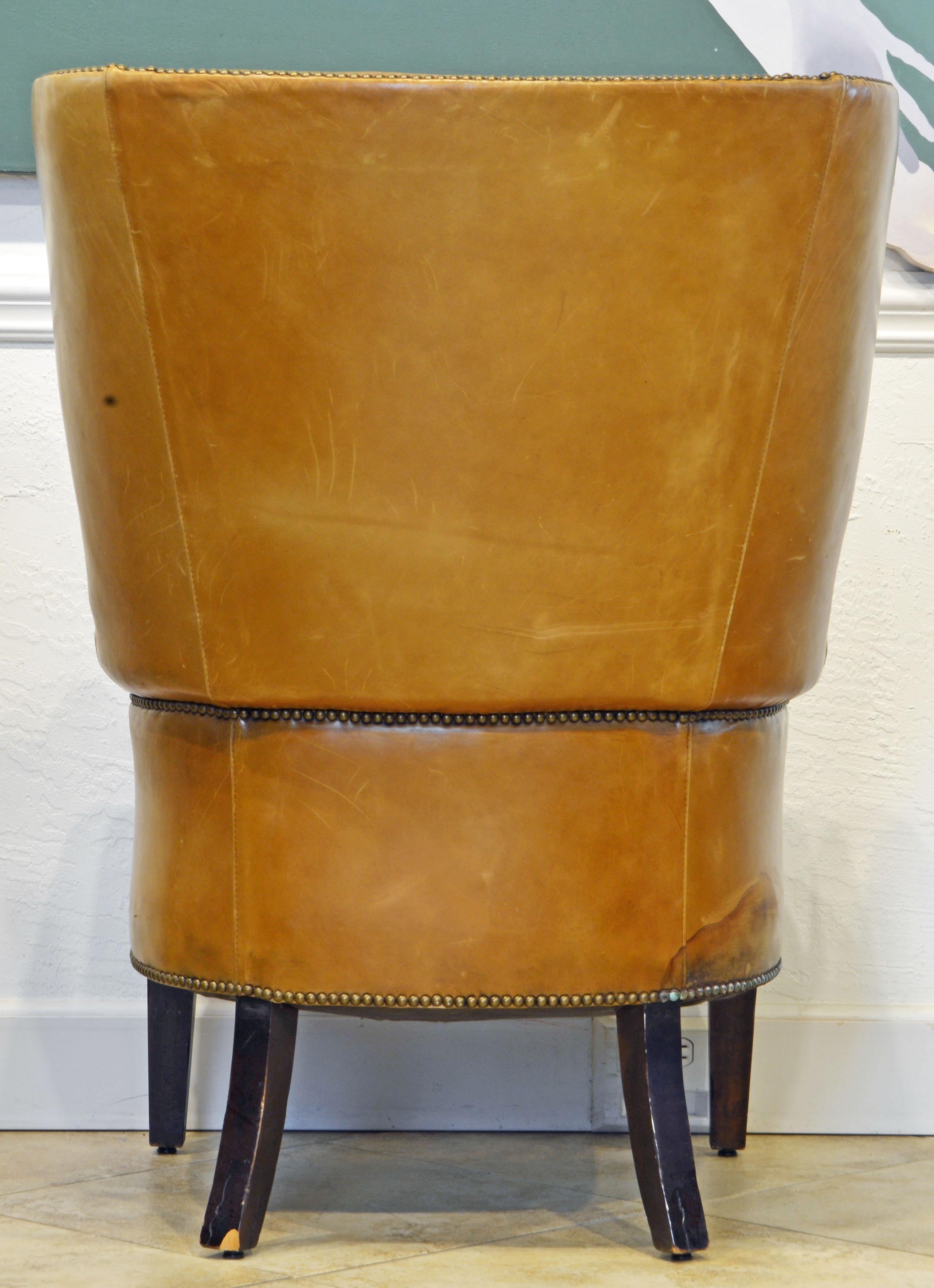 Queen Anne American Vintage Leather Covered and Nail Head Trimmed Wing Back Chair, 20th C.