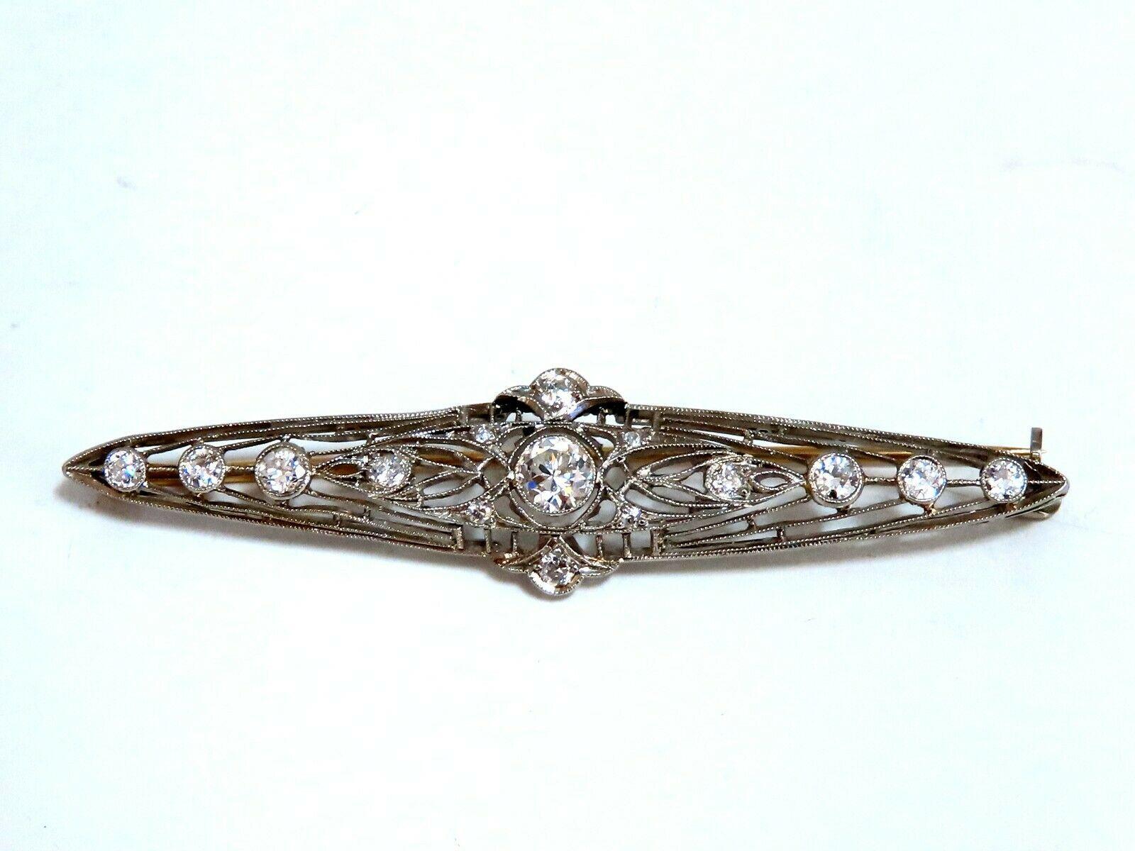 American Vintage Revival.

.70ct. diamonds brooch pin.

Rounds, Full cut Brilliant.

G-color Vs-2clarity.

14kt gold 

5.2 grams.

Overall: 2.1 X .49 inch

Excellent made 