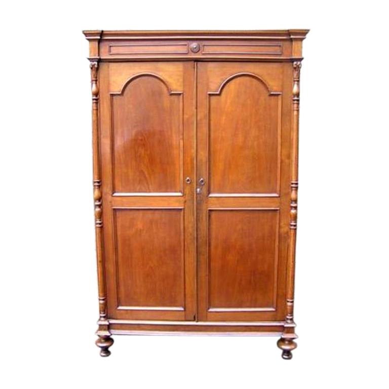 American Walnut Hinged Armoire with Arched Doors and Interior Shelving. C. 1810