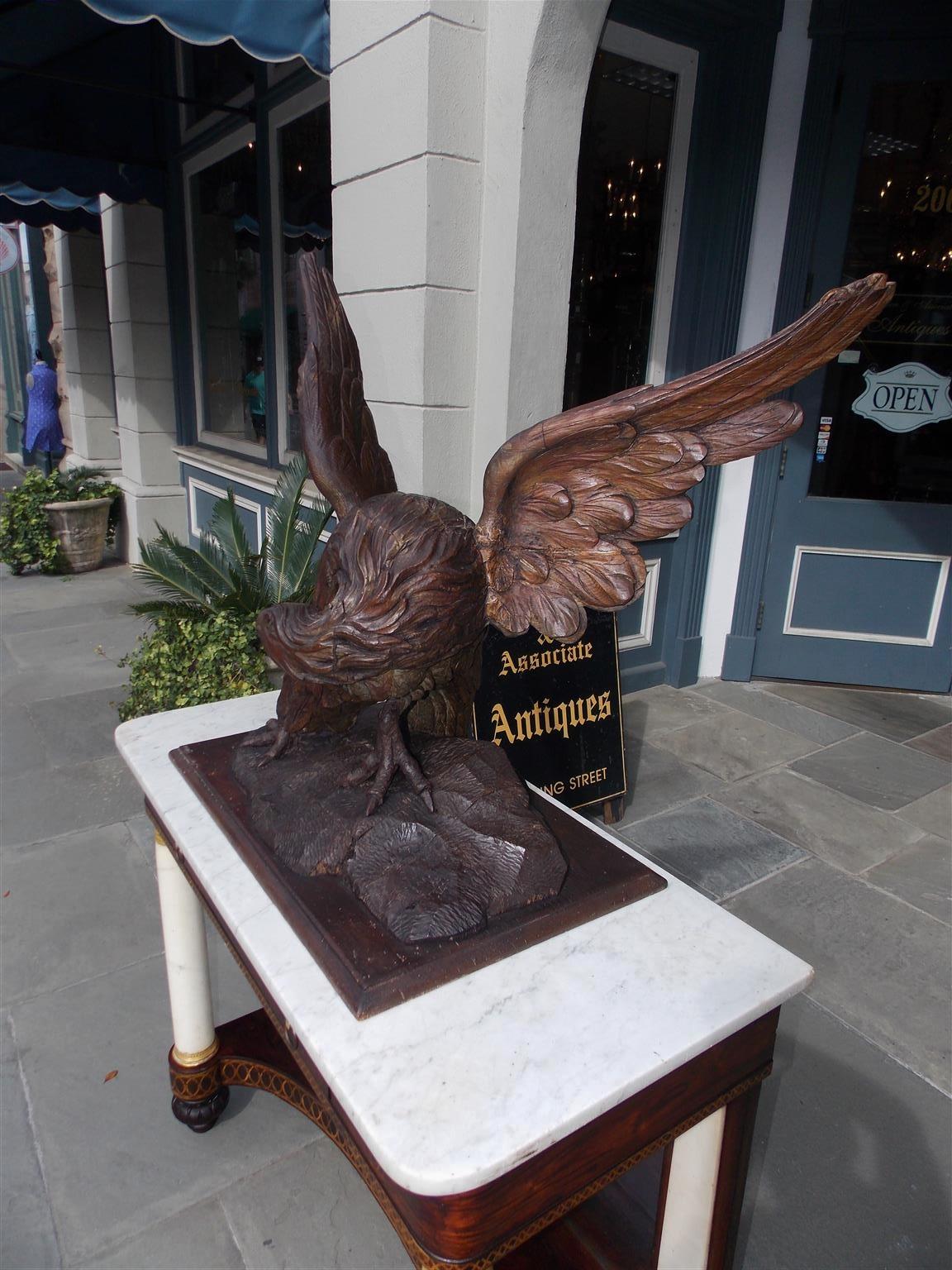 American Empire American Walnut Carved Spread Wing Eagle Perched to Flee on Rocky Plinth C. 1830 For Sale