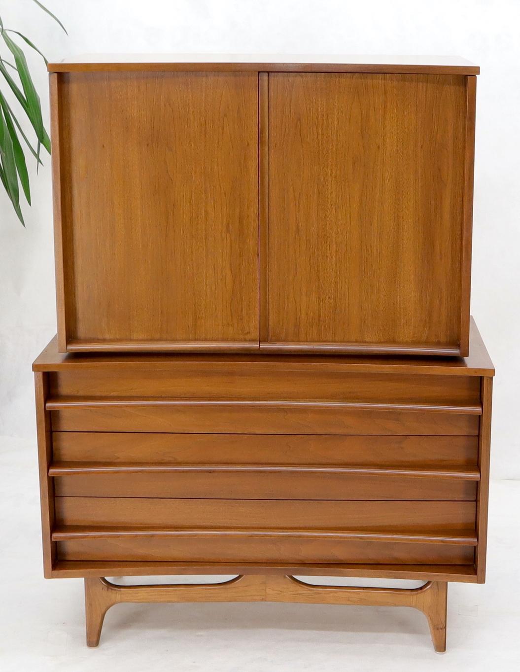 Mid-Century Modern American walnut high chest dresser with double doors compartment.